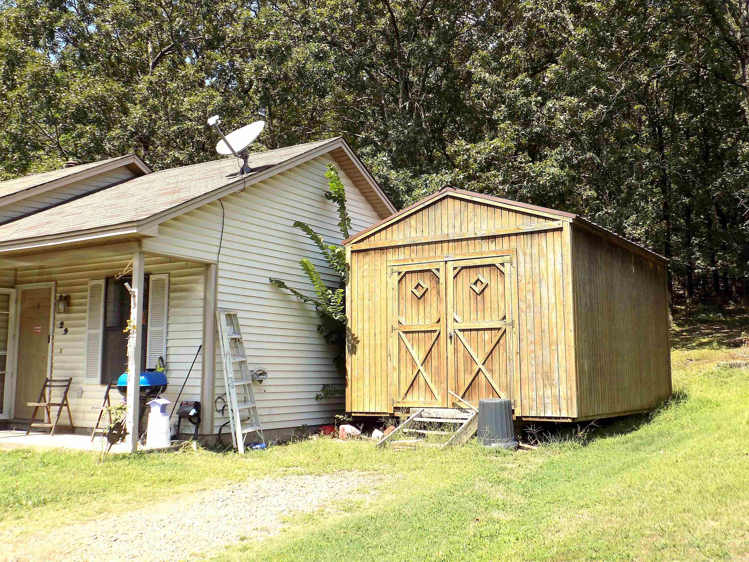 3 bed 1 bath with 11x16 storage building. Home features Lvt flooring and ceramic tile. Bay window in the large bedroom with a walk in closet. Bathroom is good size with a garden tub shower unit.