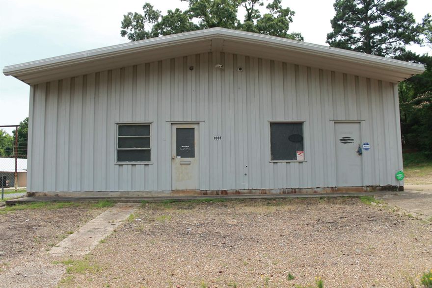 Auto mechanic shop at present; Large 2400 square feet metal building  with extra lot for additional parking;