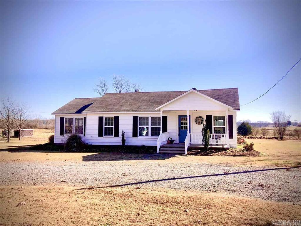 This doll house looks like it's out of a storybook. Original wood floors in most of the home but newer hardwood in the rest. Kitchen and baths have been remodeled, big living/dining rm a cute little sunporch, mudroom and porches on the front and the back of them home. There is a Murphy's bed in one of the rooms that is used as the third bdrm but there is a room with double doors that could be used as a nursey or an office. LOTS and LOTS of possibilities with this home! The roof is new 2025, all electric inside and move in ready. This home offers that character and charm of yesteryear and invites you in from the front step. This home sits on an acre and has a tree swing in the yard (you'll be tempted to sit and swing awhile! Call for your tour of this home!