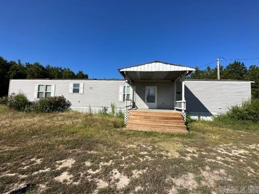 Don't miss your opportunity to own this affordable home with almost 9 acres. Open floor plan. Home is in beautiful condition with all kitchen appliances.  Nice front porch and 2 sheds.  Well needs to be checked out.