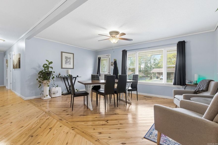 Charming 3-bedroom, 2-bath home in a convenient Hot Springs location! Beautiful wood floors!  Spacious family room with fireplace offers a warm and inviting atmosphere. Enjoy the outdoors on the covered back patio—perfect for relaxing or entertaining. Just minutes from area lakes, Oaklawn Racing Casino Resort, and all Hot Springs has to offer. Currently tenant occupied. Great opportunity for investors or future homeowners looking for a well-maintained property close to all that Hot Springs has to offer! Contact Listing Agent for showing.  24 hour notice for all showing appointments. Agents see remarks.