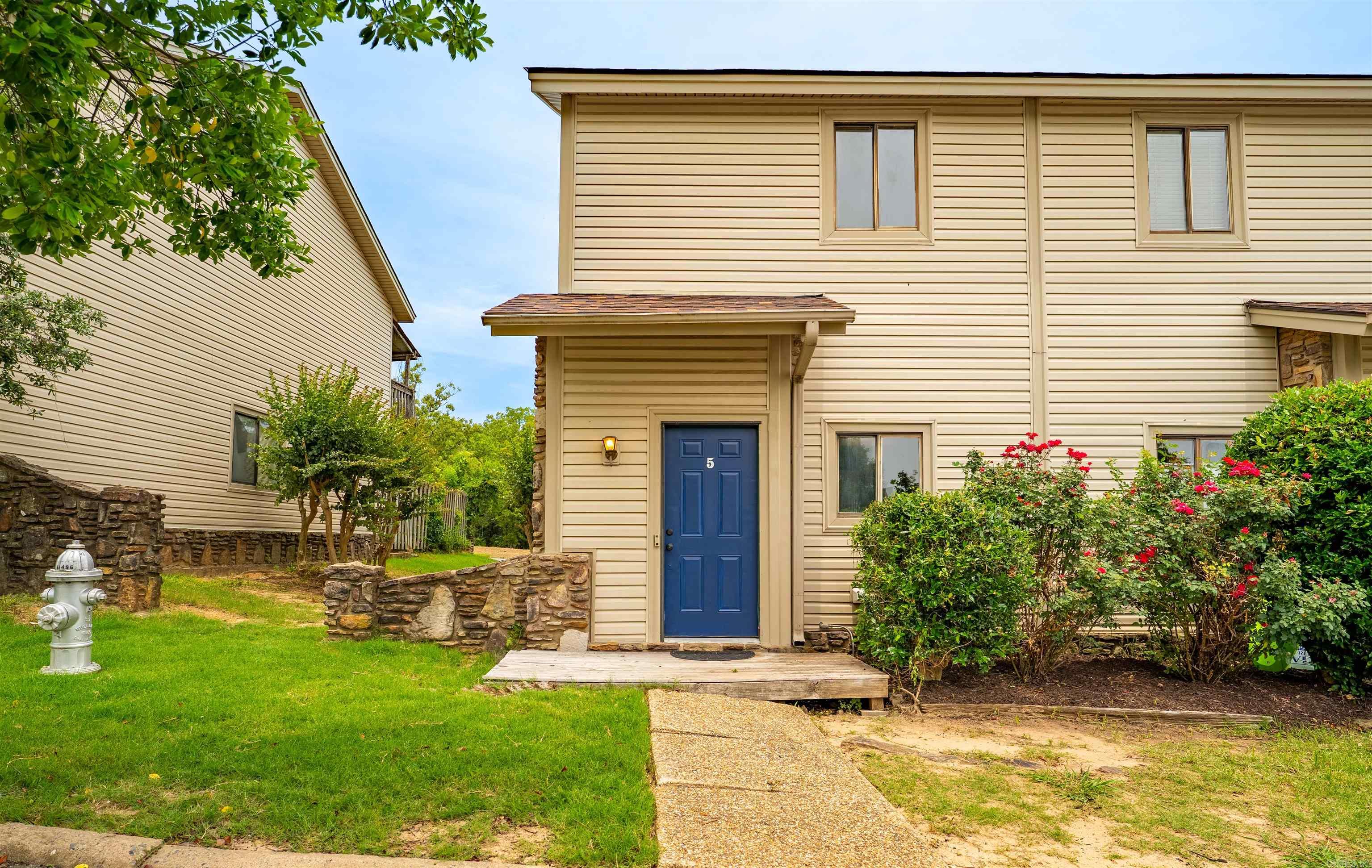 This lovely townhome is nestled in a quiet, family-oriented neighborhood in Maumelle, Arkansas. Featuring 2 bedrooms and 1.5 baths, it’s been thoughtfully updated with fresh paint, new carpet in the bedrooms and stairs, and luxury vinyl flooring throughout the kitchen, living room, and bathrooms. The kitchen boasts granite countertops, a new backsplash, and updated light fixtures throughout the home. The primary bathroom offers a newly installed shower insert and vanity. Step outside to enjoy a private patio and a spacious outdoor storage area. A hidden gem of this home is the private neighborhood trail system leading directly to the community center and school—no need to cross a main road. Nearby parks, pools, and local amenities make this the perfect setting for making lasting family memories. Move-in ready and full of charm!