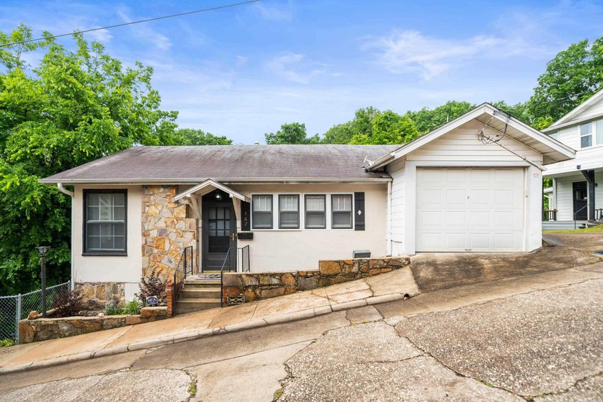 Discover this charming and beautifully updated duplex nestled right against the stunning Hot Springs National Forest—a rare find offering natural beauty, privacy, and investment potential. The upper unit, 167A, has been fully remodeled and features two spacious master bedrooms, each with its own ensuite bathroom and serene views of the forest ravine. Elegant touches like barn-style sliding doors and French doors to the master suite add a rustic-modern flair, while a third room offers flexibility as a bedroom or home office. The open living area includes a cozy gas fireplace and a fully equipped kitchen with stainless steel appliances, a gas stove, and stylish finishes. This unit also includes its own laundry area and an attached private garage. The lower unit, 167B, offers a peaceful retreat with one large master bedroom, a full bath, and an electric fireplace. It opens to a partially fenced private patio with direct views of the forest gorge and is equipped with its own window/heat unit, stainless steel appliances, and laundry. Utilities are covered in rent due to a shared meter and air system. An adjacent lot, conveys with this property, making a great investment opportunity!