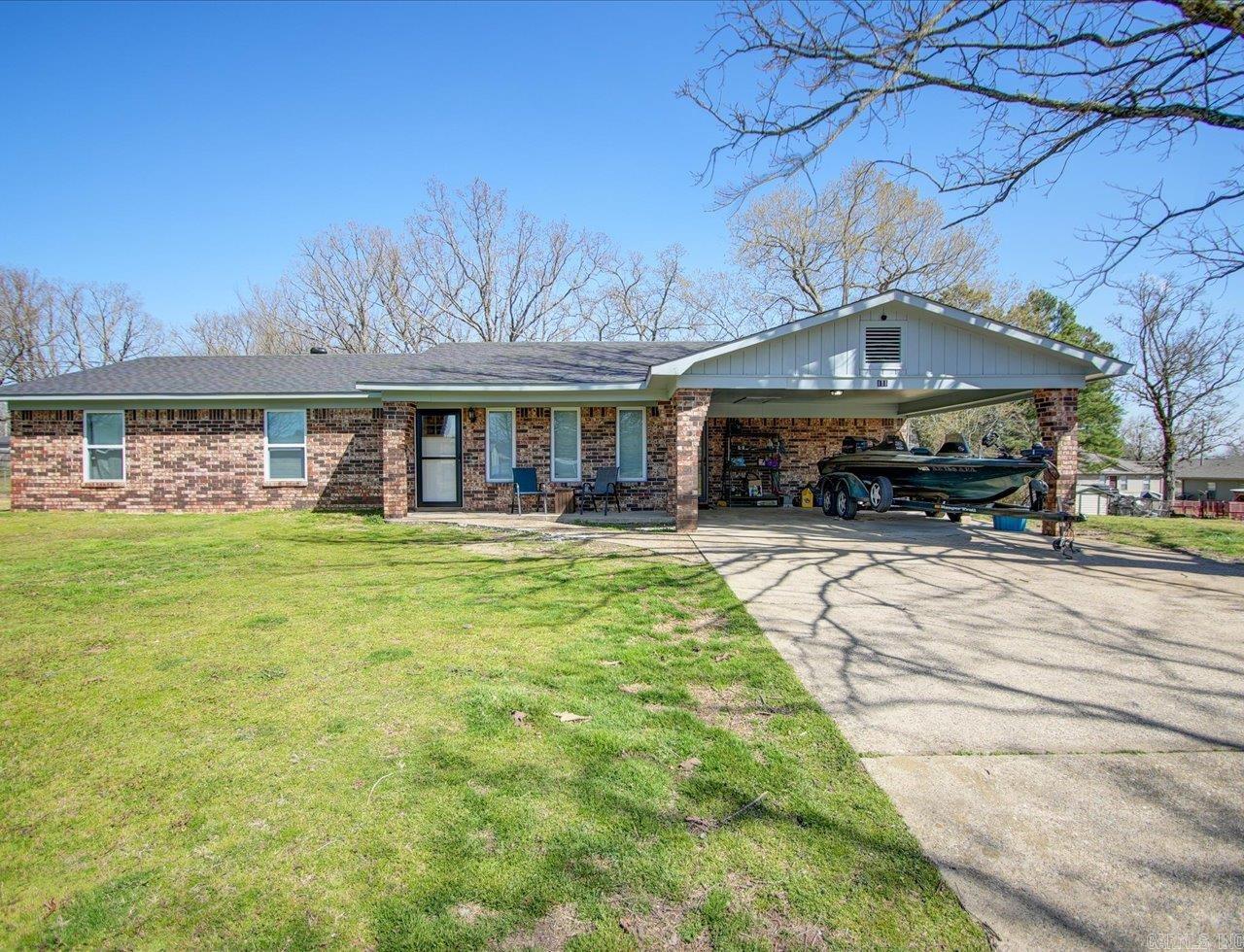 Completely remodeled 3 bed 2 bath in Lake Hamilton School District! This open floor plan home boasts luxury vinyl plank floors throughout. The oversized kitchen showcases custom made cabinets installed in 2022 covered with rough edge granite countertops. Plenty of cabinet space. All new stainless-steel appliances were installed in 2023. The master bathroom remodel was just completed. New Architectual shingled roof installed in 2025. New electrical panel and fixtures. This house is move in ready! Furnishings are available to purchase.