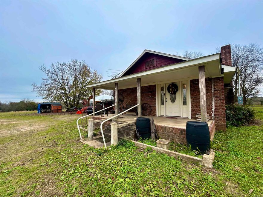 Cute, Spacious and Well-Maintained Home on almost 2 Acres! Home has 2 wells and city water! Turn this into your very own mini homestead or build your dream home or BOTH! Furnishing negotiable