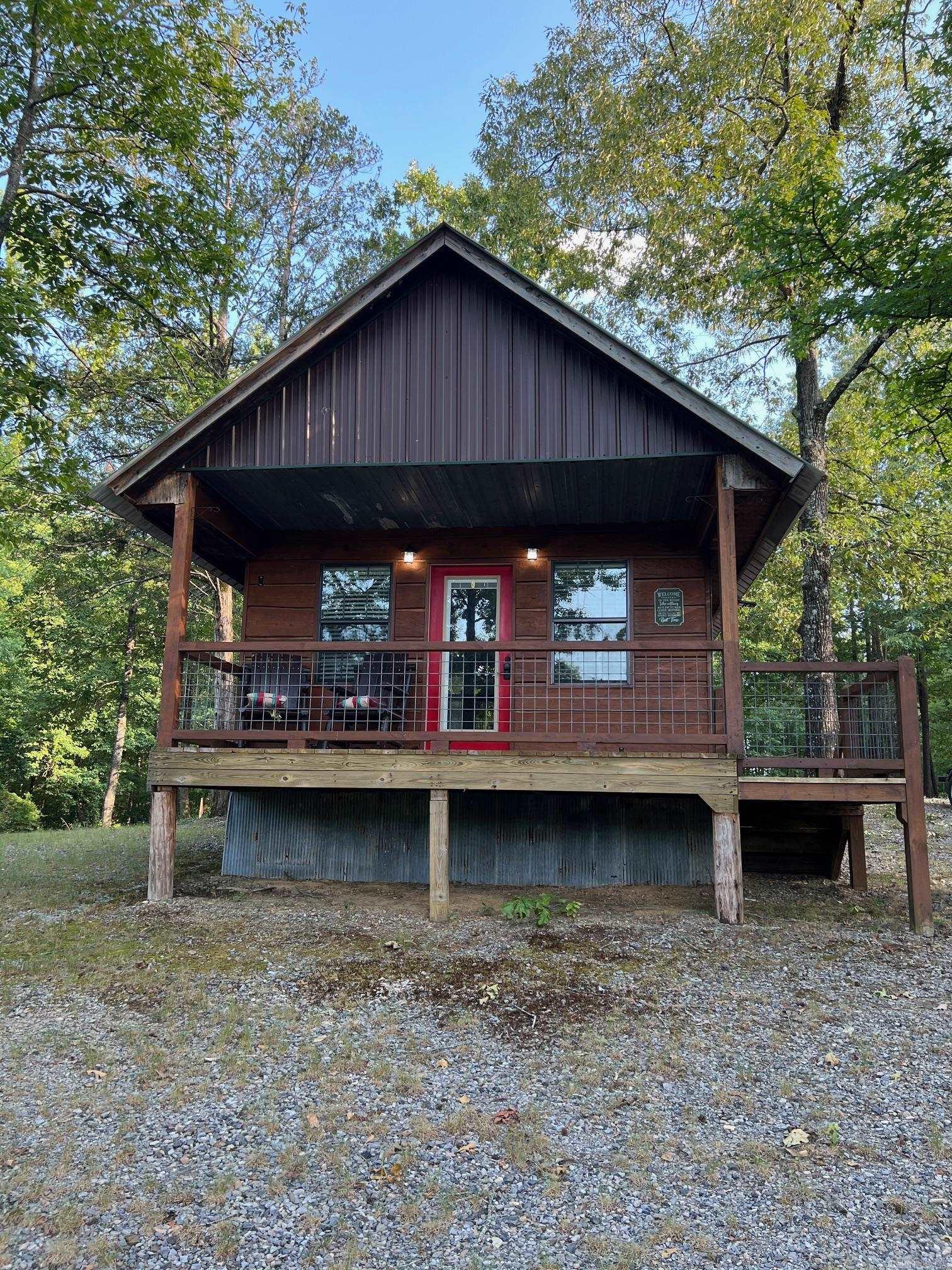 Fantastic Property along the Mountain Fork River with a very Nice Completely Remodeled Fully Furnished studio cabin. The view of the Mountain Fork River from the front porch is Amazing! RiverFront at Mountain Fork is approx. 1 mile off the paved County Road 38. It has Rural Water and Electric Coop for the utilities. This is a Fantastic Cabin Property right on the Mountain Fork River!!! Easy access to Wolf Pen Gap ATV trails and only approx. 8 miles from Mena and the New Bike Trail system. This is a Fantastic private area with Mountain Fork River frontage!!!