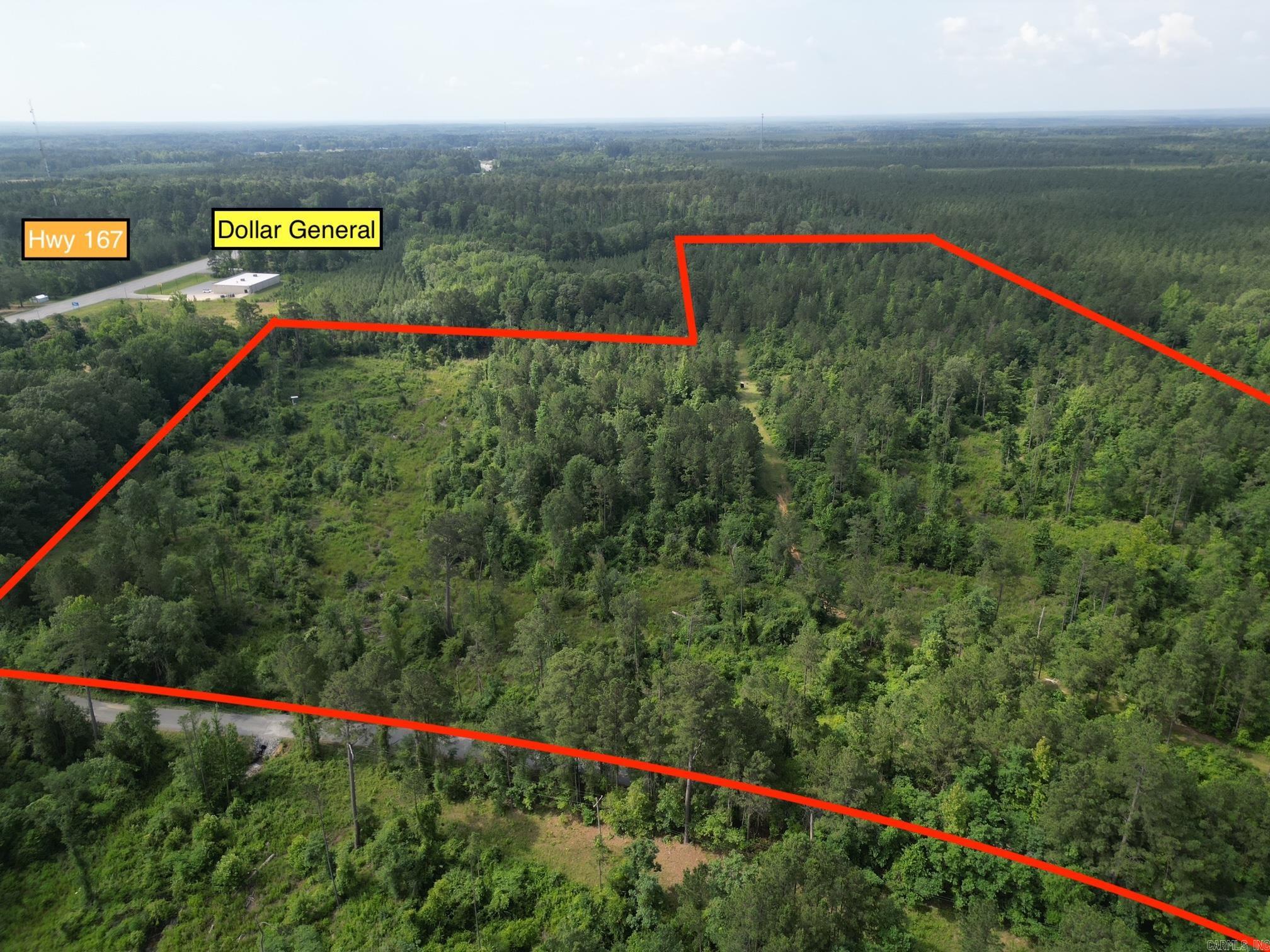 Excellent property for residential or commercial development. Access off Grant Rd 10. Backs up to Dollar General on Hwy 167. Some mature timber and lots of great building sites. Up to 90 Acres available.