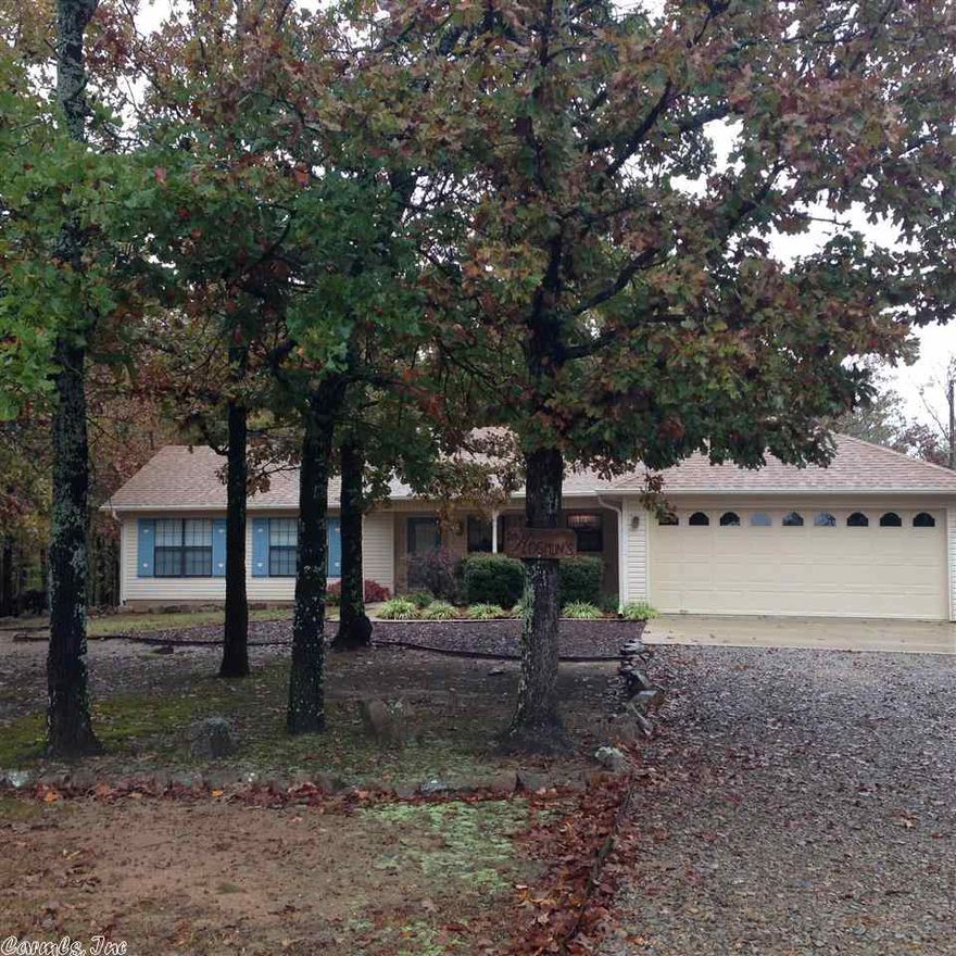 Darling home beautifully set on 5 acres of wooded bliss! Deer everywhere!  Enjoy the view from a heated/cooled sunporch in your own private paradise!  Home is immaculate with laminate flooring in open living, dining and kitchen area. Split bedroom plan with lots of closets and storage space. Living room has corner wood stove.  2x6 walls, custom wood cabinetry, oversized walk in shower in master bath & double vanity. Heat/air new in 2013, roof Nov 2012. For comps see agent notes.