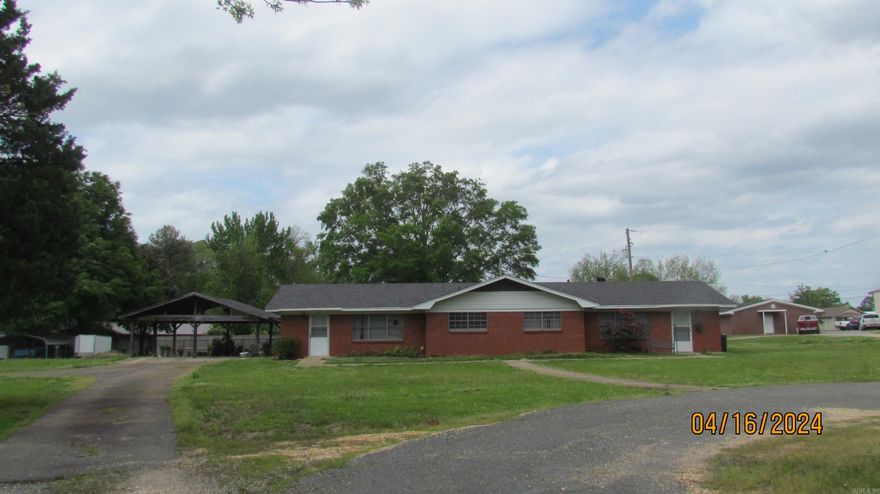 This is a duplex with 2,104 GLS, consisting of two units, one with two bathrooms, other with 1.5 bathrooms, with kitchen/dining combo, living area, laundry in bathroom, sell as is, refrigerators do not remain and storage building in the backyard belongs to renter and will not convey.  A double carport is on one side of duplex and is used for partial patio and both have a small back porch.  This duplex can be purchased with house, Listing#-403277 located in front of duplex for a purchase price of $249,900.  Property being sold as is. Legal to be determined after survey.