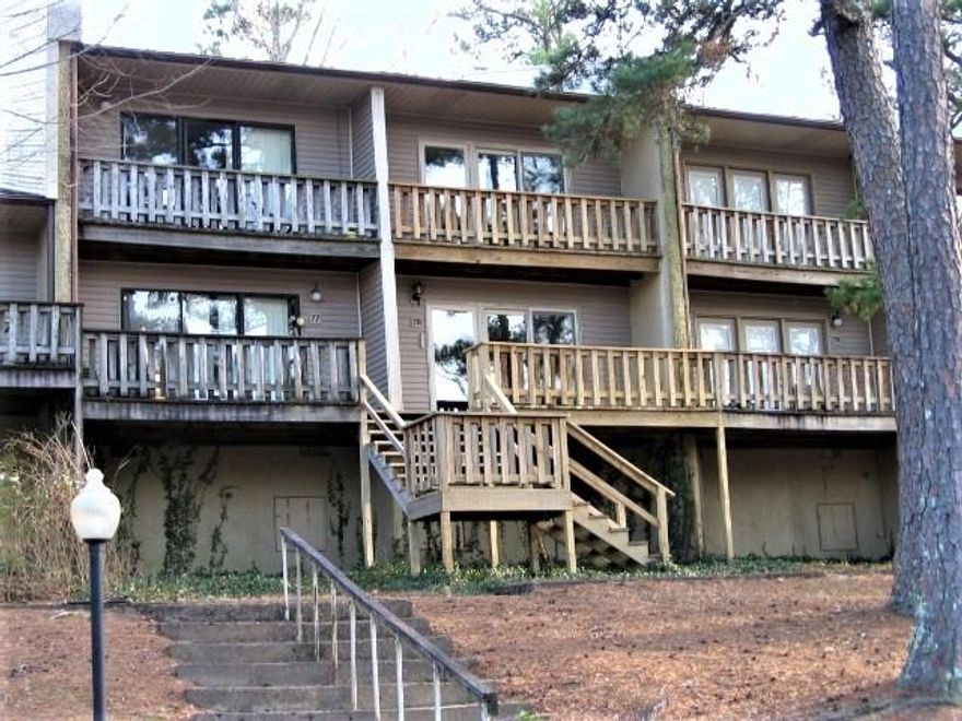 AVAILABLE FOR LEASE... 2BR, 1.5 Ba.  Kitchen has new countertops.  The kitchen  appliances, plus Washer-Dryer included.  New luxury vinyl  and new carpet.  New patio doors.  Two level -- Bedrooms and full bath are upstairs.  There are also exterior stairs from parking area up to front deck and front door.  Unfurnished.  Application required.   Call for info about utilities.