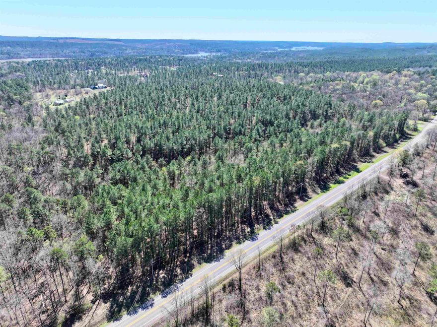 13.02± acres located off Highway 70 near Kirby, AR, outside city limits. This property offers road frontage and  potential for various uses. Situated near Lake Greeson, the land provides access to local natural attractions and outdoor recreation opportunities. Whether for development or long-term investment, this tract presents a versatile land ownership opportunity in a well-traveled area. Owner is the listing agent.