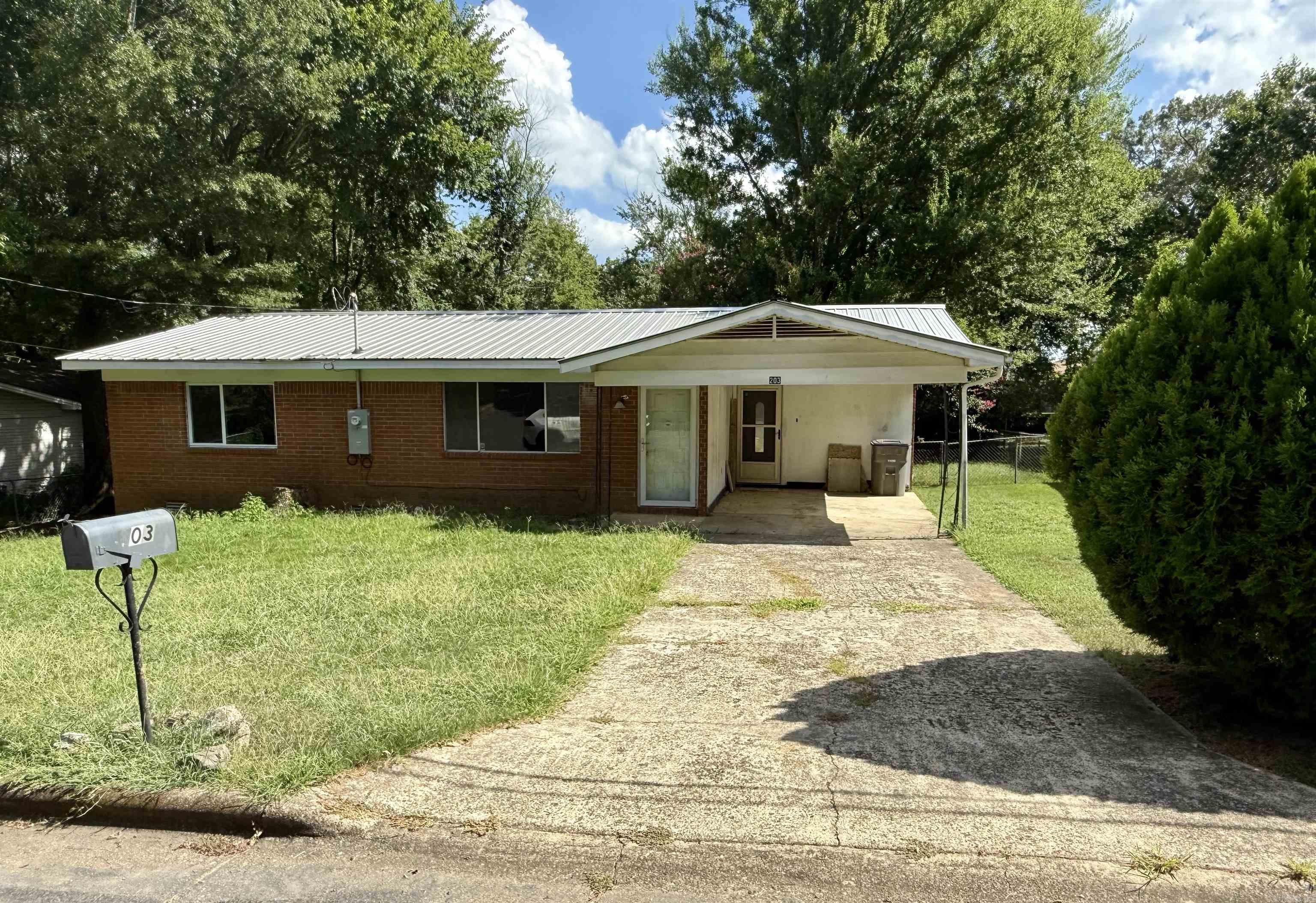 Charming 2-bedroom, 1-bath home with loads of potential. Spacious layout, great bones, and a large, fenced backyard. Prime location-Just minutes from CHI Hospital, Walmart, Sam's, and major attractions. Needs updates -- perfect for a flip, rental, or buyers with a vision.