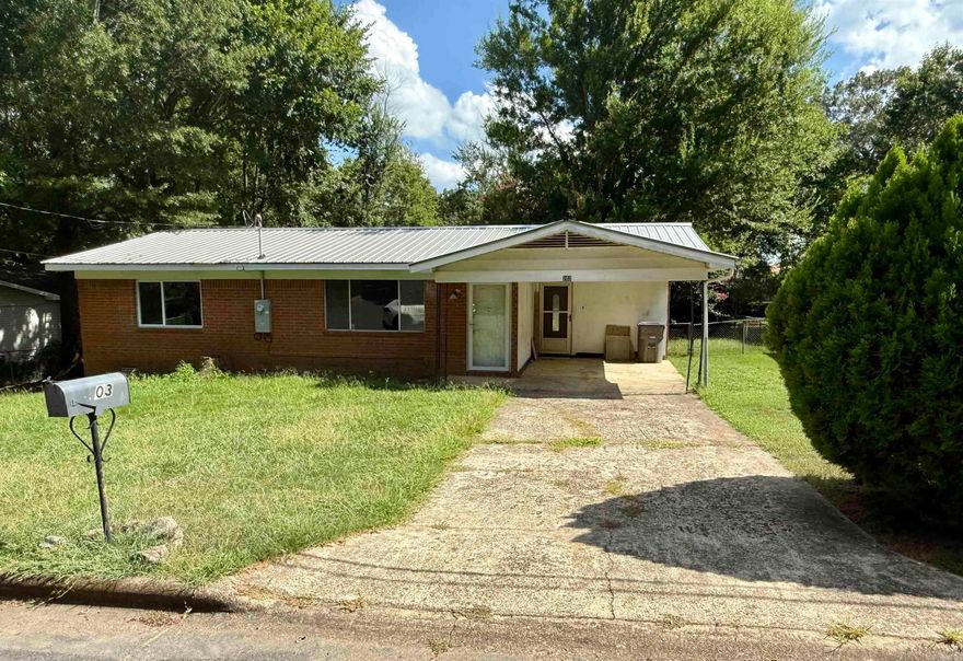 Charming 2-bedroom, 1-bath home with loads of potential. Spacious layout, great bones, and a large, fenced backyard. Prime location-Just minutes from CHI Hospital, Walmart, Sam's, and major attractions. Needs updates -- perfect for a flip, rental, or buyers with a vision.