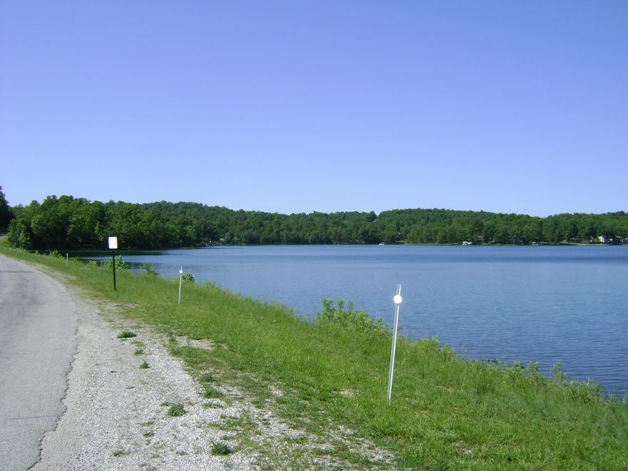 THREE NICE LOTS FOR BUILDING ON BEAUTIFUL DIAMOND LAKE.  These lots are sold as a package deal at a very reasonable price. This is a no wake lake, a good fishing and swimming lake with a city maintained boat ramp.  You can build your dream home and install your own private boat dock.  You can keep all the lots and have more privacy, or sell the extra ones. Come and see these great lots and enjoy what this town has to offer with four lakes, two golf courses, and a wonderful area to live in.  Come see it before it's gone !!
