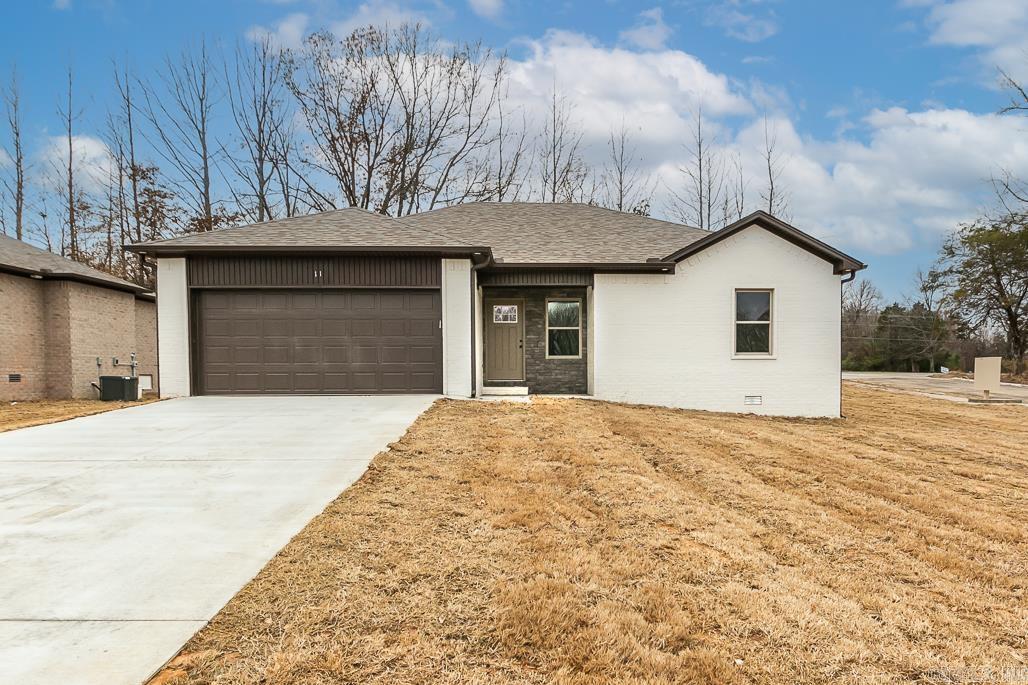 ****The builder is offering a special 2-1 RATE BUY DOWN for qualifying buyers. For more details, please contact the listing agent.**** Welcome to your NEW home! This 3 bedroom 2 bath home is perfect! Open floor plan, big living room. Great counter tops, tiled backsplash, tons of cabinets, stainless steel appliances, dishwasher and built in microwave! Farm Sink! Master bath has a double vanities and tile shower. Home includes a 2 car garage. All bedrooms are large with great closets and ceiling fans! Wood deck. Call today!