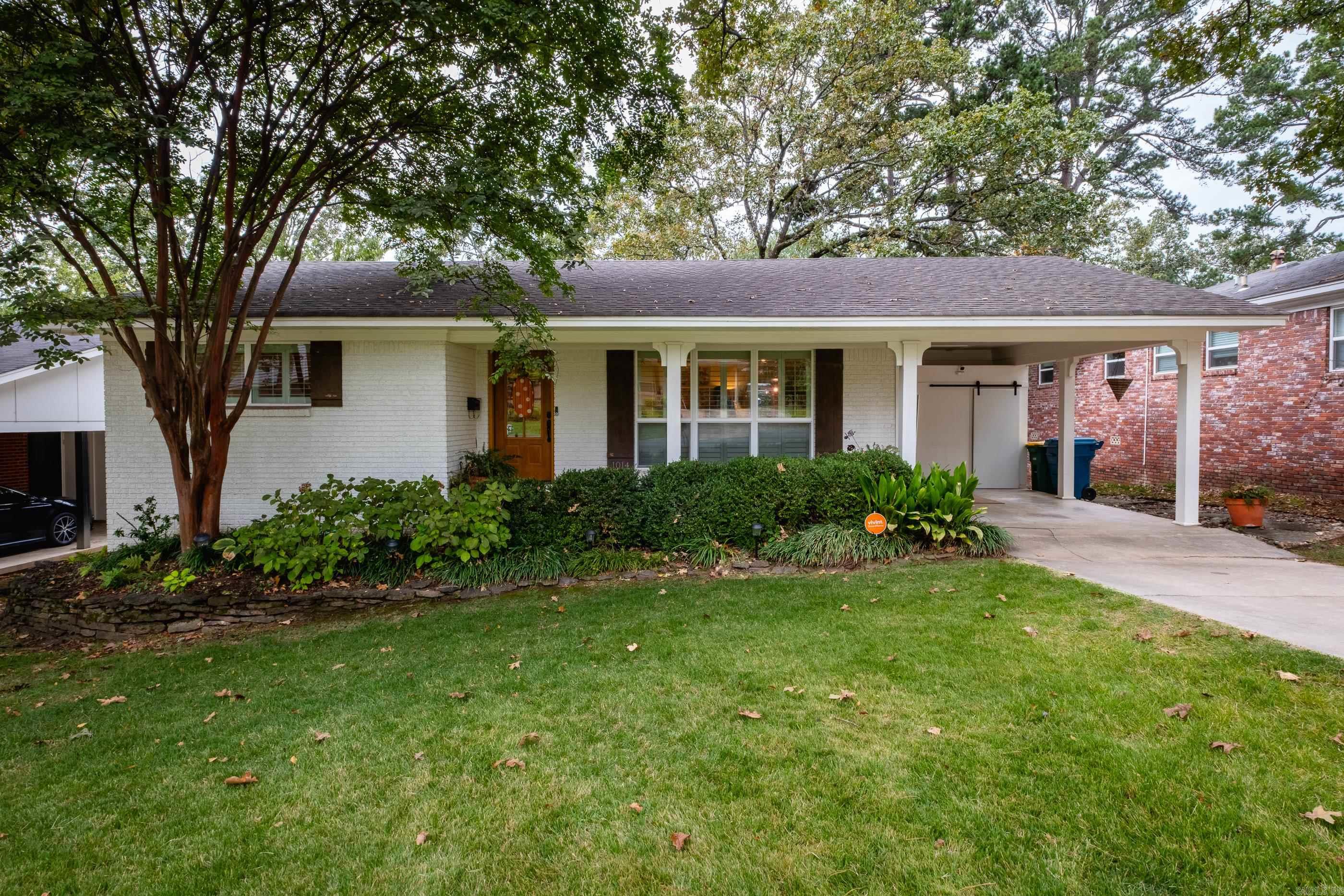 Midtown Charm Meets Modern Comfort.  Step into this beautifully updated Midtown gem, where timeless character meets thoughtful upgrades in one of Little Rockās most sought-after neighborhoods. Featuring 3 spacious bedrooms and 2 full baths, this home offers hardwood floors throughout, a sleek kitchen with stainless steel appliances, and a stylish bar area complete with a built-in ice makerāperfect for entertaining.  Enjoy morning coffee on the flagstone front porch or unwind on the expansive back deck overlooking a lush, irrigated front and backyard. Inside, youāll find custom built-ins in the living room, plantation shutters on brand-new windows, and clever storage tucked behind barn doors under the carport. The primary bedroom includes a full-size washer and dryer for added convenience.  Major updates include a new roof (2020) and HVAC system (2021), ensuring peace of mind for years to come. This is Midtown living at its finestācentral, walkable, and move-in ready.  Agents, please see remarks.