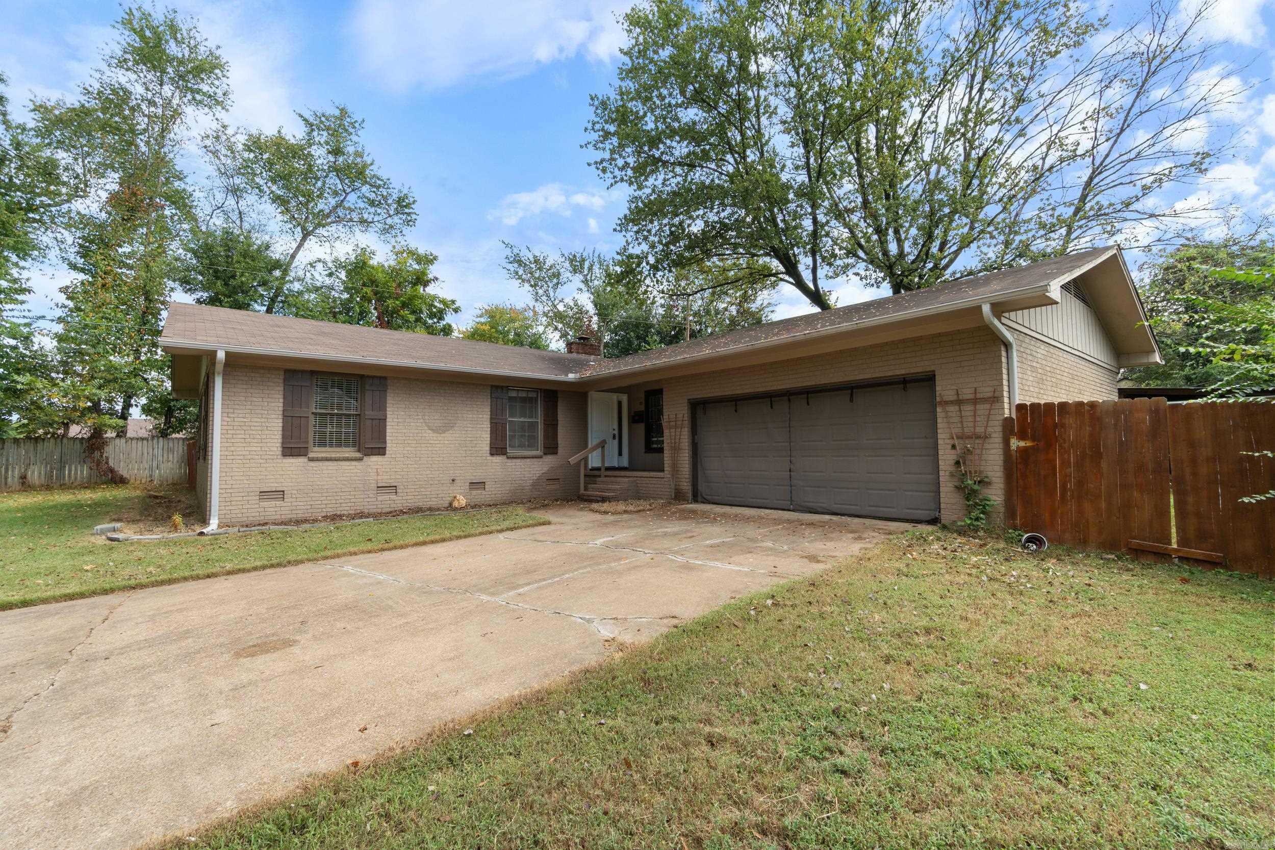 Welcome Home! Available fully furnished, if desired, this charming 3-bedroom, 2-bath home offers approximately 1,700 sq ft of living space and is tucked away at the end of a quiet cul-de-sac near Searcy High School. Inside, you'll find a beautifully updated kitchen featuring brand new stainless steel appliances, an eat-in bar, built-in desk, and backside bar cabinets—all part of a spacious open-concept layout. Original hardwood and tile flooring flow throughout the home, adding character and durability. Recent upgrades include: New roof (2019), water heater (2021), front door (2022), rain gutters with leaf guards (2023), french drain system (2023), HVAC fan replacement and cleaning (2024), plumbing service (2024), and a laundry room renovation (2025) Outside! For added security, seller is offering a 1 year home warranty as well! Enjoy generous front and back yards, a 2-car garage, large barn-style shed, storm shelter, and an RV gate—perfect for extra storage or recreational vehicles. Don't wait, schedule your showing today! Agents, see remarks regarding recent appraisal value!