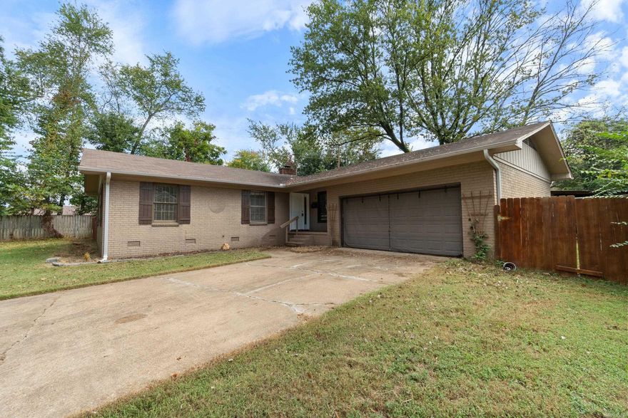 Welcome Home! Available fully furnished, if desired, this charming 3-bedroom, 2-bath home offers approximately 1,700 sq ft of living space and is tucked away at the end of a quiet cul-de-sac near Searcy High School. Inside, you'll find a beautifully updated kitchen featuring brand new stainless steel appliances, an eat-in bar, built-in desk, and backside bar cabinets—all part of a spacious open-concept layout. Original hardwood and tile flooring flow throughout the home, adding character and durability. Recent upgrades include: New roof (2019), water heater (2021), front door (2022), rain gutters with leaf guards (2023), french drain system (2023), HVAC fan replacement and cleaning (2024), plumbing service (2024), and a laundry room renovation (2025) Outside! For added security, seller is offering a 1 year home warranty as well! Enjoy generous front and back yards, a 2-car garage, large barn-style shed, storm shelter, and an RV gate—perfect for extra storage or recreational vehicles. Don't wait, schedule your showing today! Agents, see remarks regarding recent appraisal value!