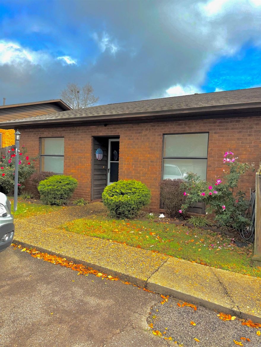 Located in the Charmany Square community, this move in ready 2 bedroom condo features a functional layout, updated finishes and plenty of room to relax. Enjoy a modern kitchen, spacious bedrooms, and a cozy, private patio for enjoying the beautiful Arkansas weather. This property is conveniently located near shopping, dining, historic attractions, hiking trails, and lakes. New roof and hot water heater in 2025. This all brick one level condo also features a private fenced patio with garden area and outdoor storage. Property amenities include a covered pavilion and outdoor pool for all to enjoy.  Great for homeowners or investors seeking a low maintenance property in a prime location. Call today to schedule your appointment!