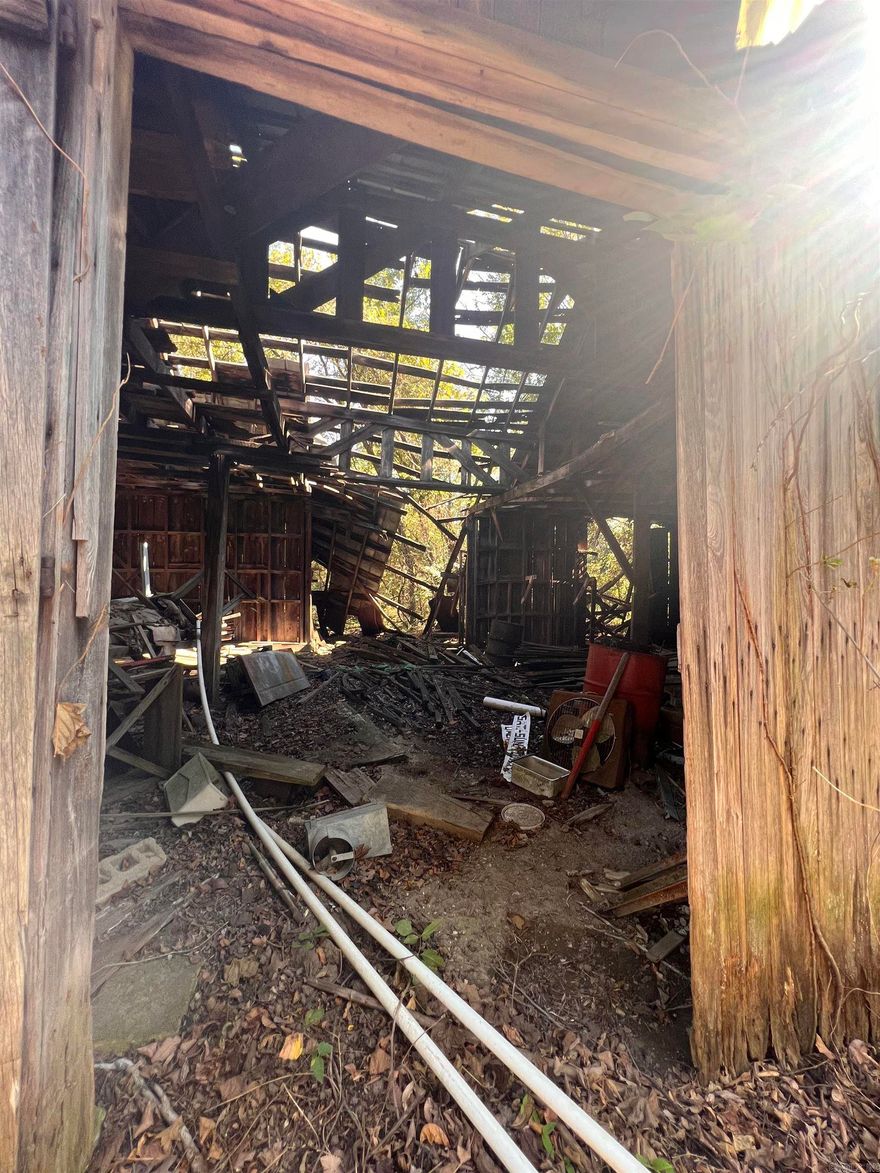 This 2.5 acres has some history. 70+ years ago is was the Batavia, AR cannery where tomatoes and other things were canned and distributed. It has been a farm supply store, chicken house and a few other things. There are 3 vintage buildings on the land including the cannery. You can also see where they washed tomatoes and the old broiler provided what they needed to can with. Check out this property and you can own a piece of Boone County, AR History.