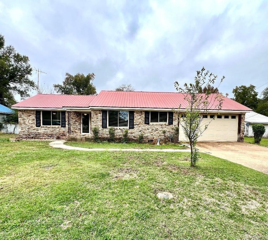 This home is being sold "AS-IS" no repairs!! Large home with 3-4 bedrooms and 2 full bathrooms sitting on 1.71 acres inside city limits! This home is perfect for buyers on a budget that still need space! Can be made to accomodate a 4th bedroom or a second den or office. Own a home for less than rent! Tons of Charm and a few upgrades already done! Central H&A 10 years old with new fan, newer plumbing and subfloors. Gas stove and water heater.  The home comes with RV or Boat storage, Fenced backyard and a double garage. Investors welcomed!