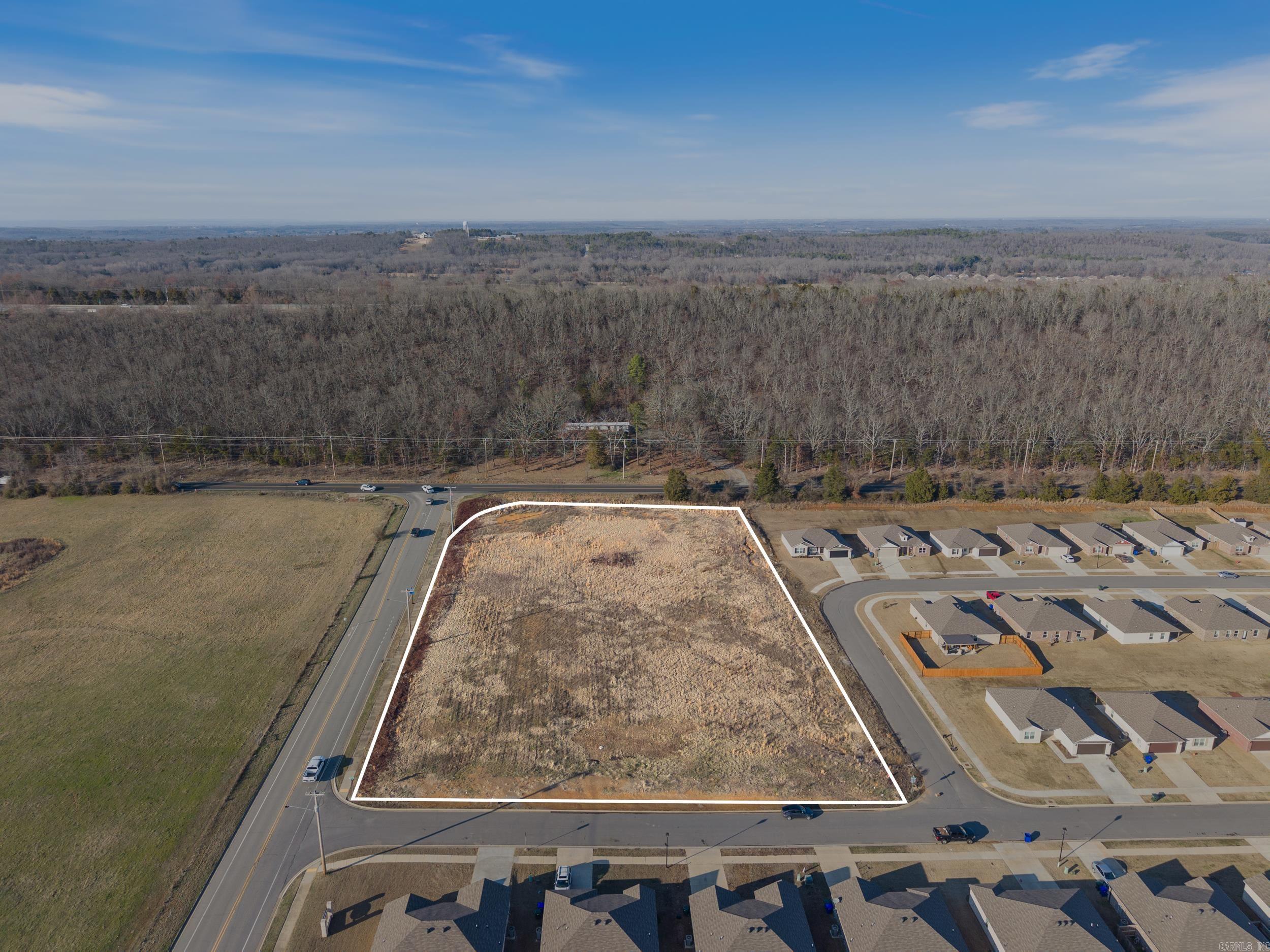 Prime commercial opportunity at the corner of Museum & Lower Ridge! This 2.55-acre cleared lot is zoned C-2 and approved for a conditional use permit for a gas station. City Planning has identified this as the highest and best use, but it can accommodate any C-2 business. Positioned along a high-traffic cut-through from Highway 65 to Highway 64 and Oak Street, this location offers unmatched convenience for daily commuters. With no gas stations along this route, the demand is high among travelers, local residents, and businesses. Surrounded by neighborhoods, multifamily properties, a dog park, restaurants, retail, and a sports center, this site guarantees strong customer traffic. Recent road improvements at Highway 65/Skyline, and Lower Ridge Road have further increased daily commuters! Don’t miss this prime investment opportunity in a growing area!