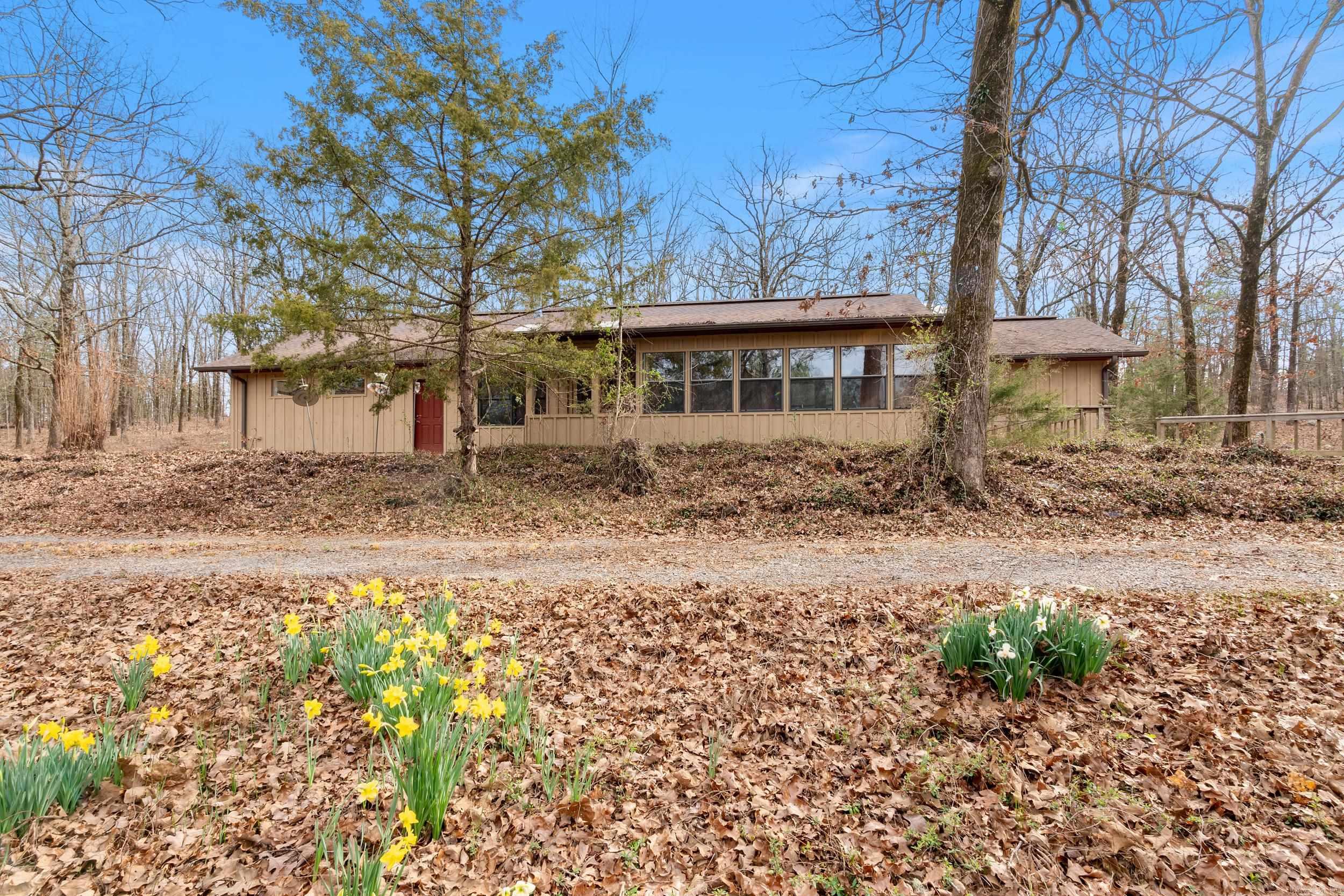 A true Gem in the country! You must see this great, newly renovated home with 3 bedrooms and 2 full baths. A large living area with a freestanding wood stove a sun room and a large 2 car garage. HVAC, roof and water heater all replaced with in the last 5 to 6 years. Most of the 8.57 acres are wooded and provide a lot of privacy, peace and quiet. A close drive to downtown Vilonia and close to all Conway has to offer. The refrigerator, washer and dryer all convey with the property. The home is well insulated and easy to heat and cool.