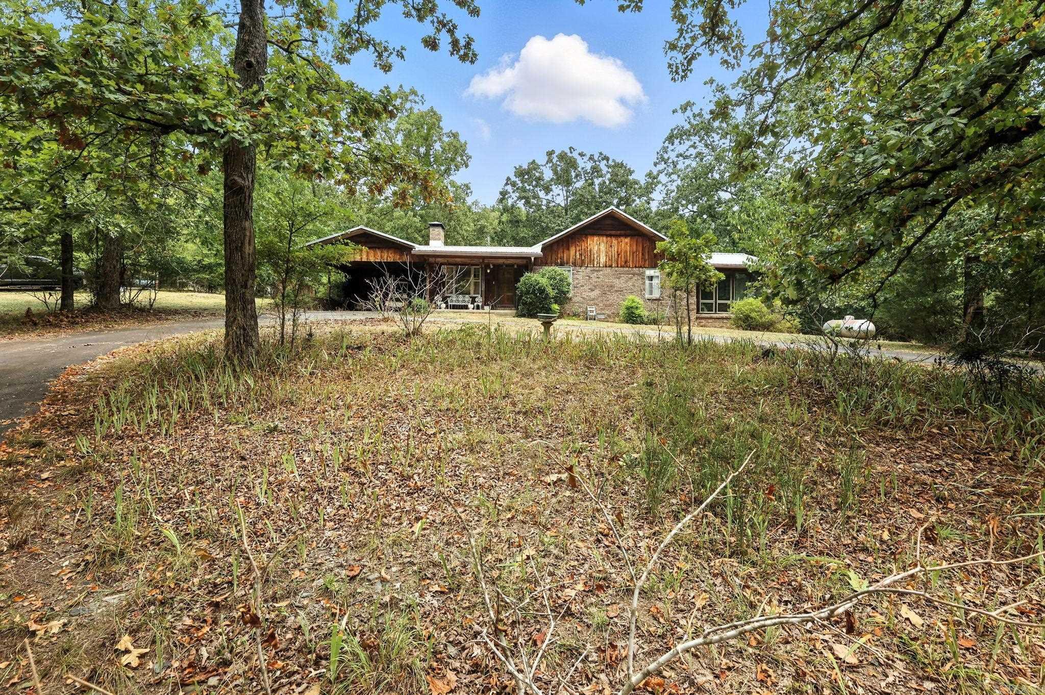 A rare find in the heart of West Little Rock, with 5 acres of possibility! Welcome to 9 Cape Street, a vintage charmer tucked away on an unheard-of 5 acres in the middle of West Little Rock. Yes, you read that right. Just a short stroll to Costco and the Kroger Marketplace on Chenal, this is a once-in-a-lifetime chance to own usable land in a location where it simply doesnāt exist anymore. Whether you dream of restoring a home with soul, building your custom estate, or starting a hobby farm, the possibilities here are endless. The home itself is being sold as is with no disclosures and has been lovingly lived in by the same family for decades. Inside, youāll find original hardwood floors and authentic vintage details that tell a story of simpler times, just waiting for your modern touch. A picturesque circle drive winds through mature trees and serene natural surroundings, offering peaceful seclusion in the city. Multiple outbuildings are also located on the property, providing room for storage, workshops, or creative ventures. Donāt miss your chance to reimagine this special property and write its next chapter. 9 Cape Street is ready, are you?