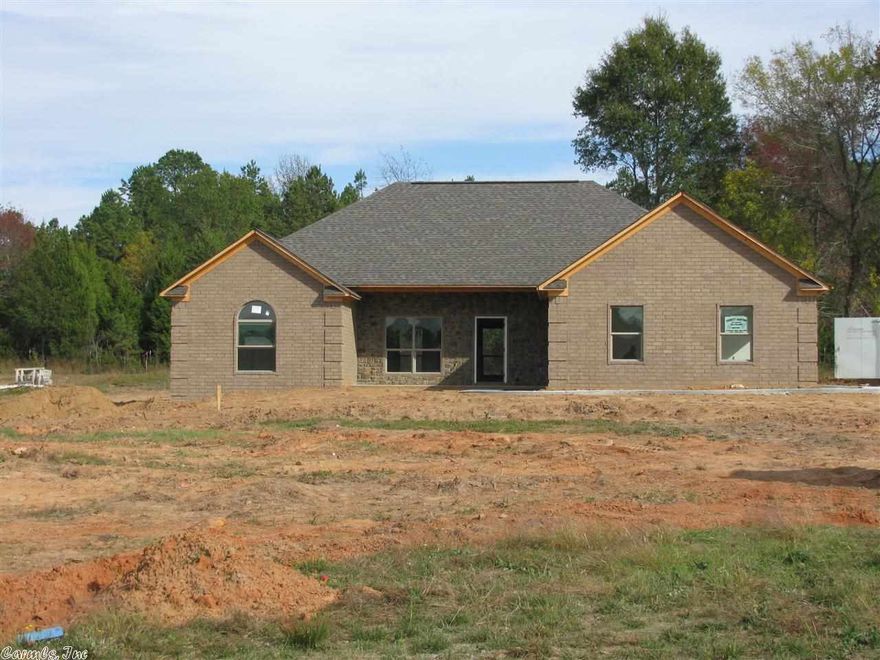 This new construction home features a large level lot, low E windows, radiant barrier decking blown fiberglass insulation, granite counter tops in kitchen, and much more.  A must see to appreciate.