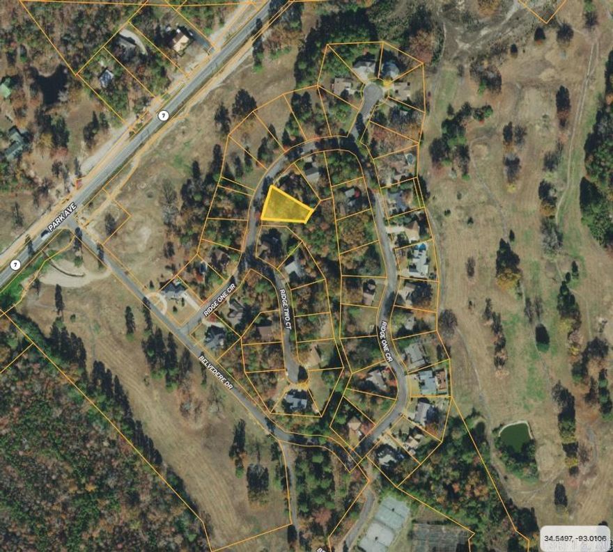 Beautiful lots in existing subdivision. Near new bypass.  All utilities available.  Located off of scenic Hwy 7.  5 minutes to Historic Downtown Hot Springs.  Less than 7 miles from Oaklawn Racing & Gaming. Near HSV and Bike Trails. Subdivision in old Belvedere Golf Community is surrounded by over 500 acres of Dept of Agriculture acreage. Steep, wooded lot, vista views.