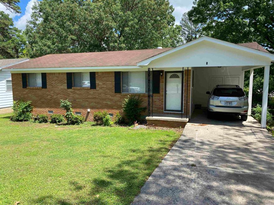 This updated three bedroom one bathroom house is ready for someone to call it home. Located just blocks away from Baptist Health Center, this home offers the charm of an established tree shaded neighborhood. The convenience of a central location in the city, also allows easy travel access to all areas of central Arkansas.  Updates include paint, flooring, kitchen updates include countertops, range, bathroom, blinds, lighting. Don't miss this move in ready home and enjoy the wonderful back yard.  Covered parking in the carport. Measurement is encouraged. Sq Ft is from courthouse and not to be relied upon. Agents see remarks.