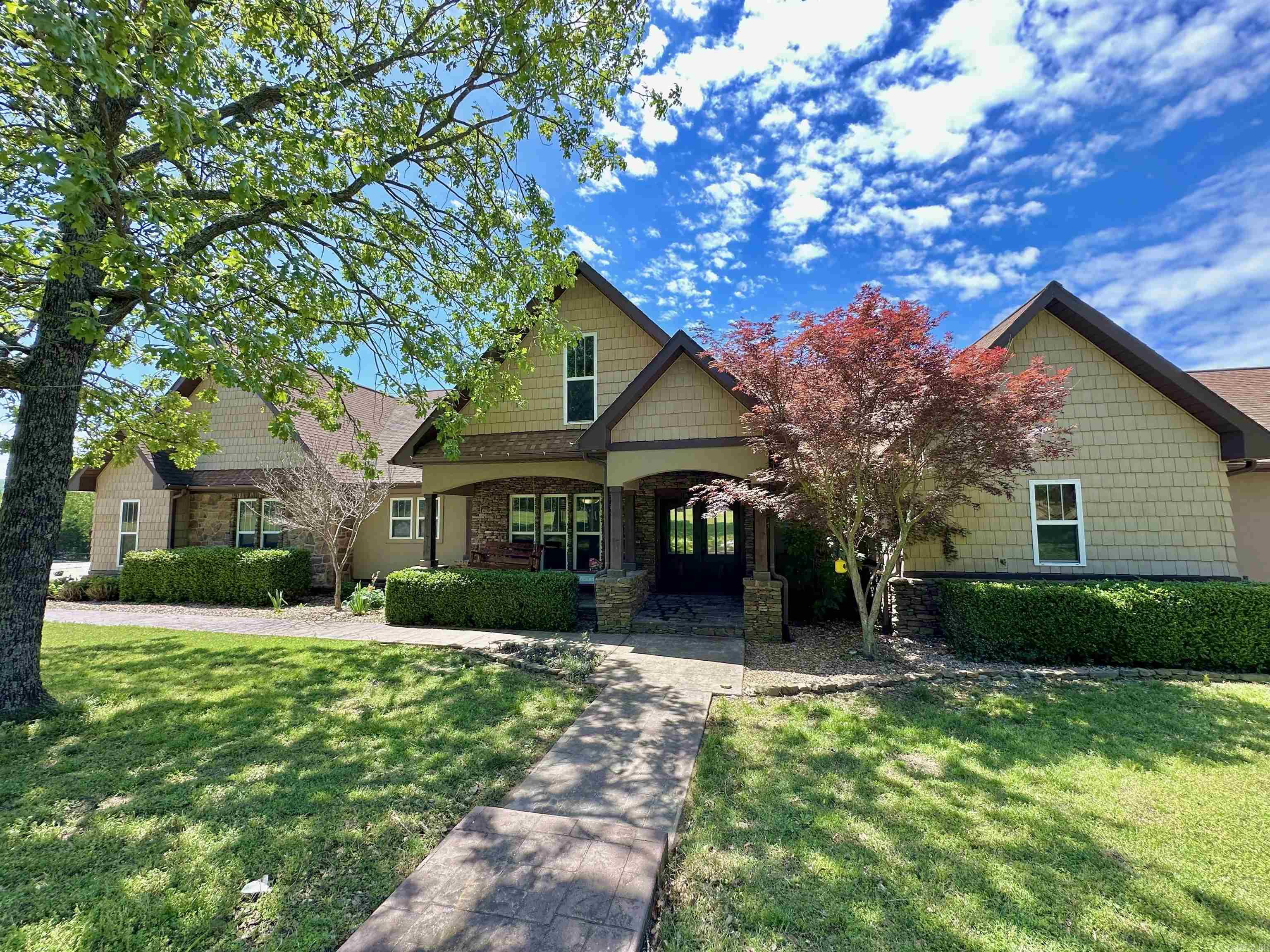 Dream home on 10 acres with a stunning mountain view & a big, beautiful yard, complete with a fence for privacy & large stocked pond. This custom-built home that has recently been updated offers over 6,000 sqft. of living space along with 5 bedrooms & 4.5 bathrooms. The large living area features a gas log fireplace & multiple windows with a view of the property. The kitchen is a dream, featuring custom cabinets, stainless appliances, lots of storage space & pantry. There is a formal dining area along with a breakfast bar. The Master suite features a large bedroom with a sitting area, full bathroom with his/her sinks, massive walk in tile shower, jacuzzi tub, & oversized walk in closet. All guest bedrooms are designed with large closets & two adjoining bathrooms. Bonus rooms include an office, den/family room that is being used as a theater room, work out room, & play area! The outdoor entertainment area is perfect for hanging out, grilling, or enjoying the view of the mountains. Great place for a hobby farm close to all amenities. This place really is something special, offering the perfect mix of luxury and laid-back living.