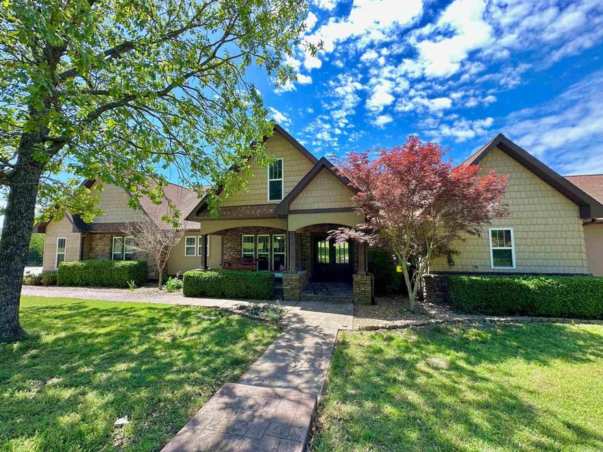 Dream home on 10 acres with a stunning mountain view & a big, beautiful yard, complete with a fence for privacy & large stocked pond. This custom-built home that has recently been updated offers over 6,000 sqft. of living space along with 5 bedrooms & 4.5 bathrooms. The large living area features a gas log fireplace & multiple windows with a view of the property. The kitchen is a dream, featuring custom cabinets, stainless appliances, lots of storage space & pantry. There is a formal dining area along with a breakfast bar. The Master suite features a large bedroom with a sitting area, full bathroom with his/her sinks, massive walk in tile shower, jacuzzi tub, & oversized walk in closet. All guest bedrooms are designed with large closets & two adjoining bathrooms. Bonus rooms include an office, den/family room that is being used as a theater room, work out room, & play area!  The outdoor entertainment area is perfect for hanging out, grilling, or enjoying the view of the mountains. Great place for a hobby farm close to all amenities.  This place really is something special, offering the perfect mix of luxury and laid-back living.