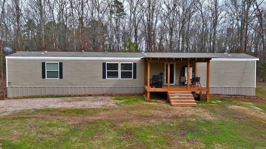 PRICE REDUCTION! MOTIVATED SELLER! NOW $199,900! CHARMING 2020 MODEL 3BEDROOM 2 BATH HOME ON 5 ACRES!  THE ULTIMATE LIFESTYLE! REVEL IN THE SECLUSION OF 5 ACRES WHILE STILL ENJOYING THE CLOSE PROXIMITY TO DOWNTOWN HOT SPRINGS! BATHHOUSE ROW IN THE STUNNING HOT SPRINGS HISTORIC DISTRICT, IS JUST 5 MILES AWAY! DISCOVER THE ADDED JOY OF BEING ONLY 1.5 MILES FROM THE NORTHWOODS TRAILS , 4 MILES FROM VULCAN PICKLEBALL PARK , 10 MILES FROM LAKE OUACHITA BOAT RAMP AT ECHO CANYON MARINA, AND ONLY 20 MINUTES FROM HOT SPRINGS VILLAGE! WHAT AN INCREDIBLE LOCATION! THIS QUAINT HOME, BUILT IN 2020, BOASTS AN OPEN FLOOR PLAN AND SPACIOUS DECK, CREATING THE PERFECT HAVEN TO UNWIND, REJUVENATE, OR PURSUE YOUR PASSION FOR HUNTING!  TURN THIS DREAM INTO A REALITY, WHETHER AS YOUR FOREVER HOME OR A WISE INVESTMENT AS A STRATEGICALLY LOCATED AIRBNB! SEIZE THIS OPPORTUNITY TODAY!