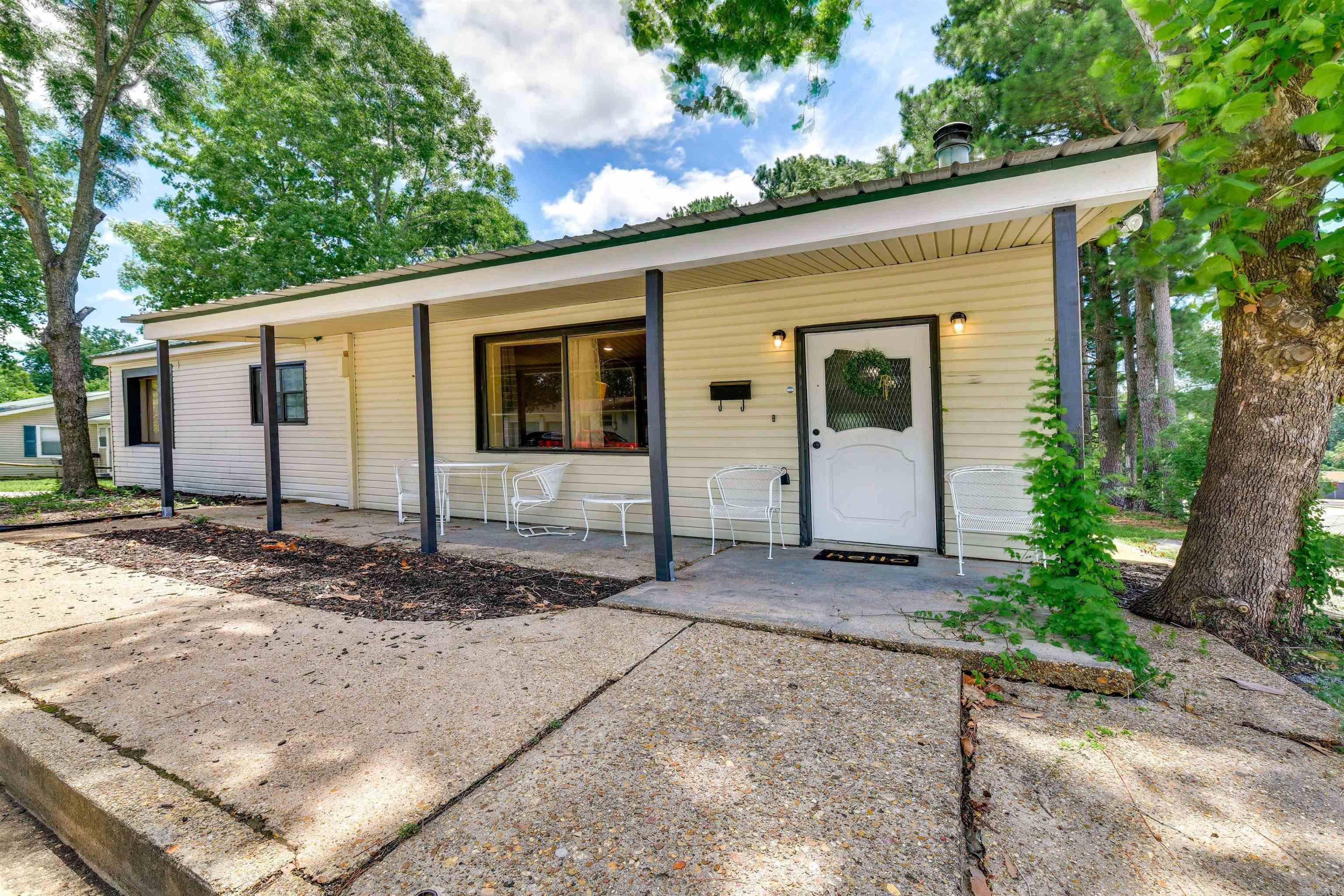 This beautiful, updated home in a prime Jonesboro location is calling your name! The covered front porch is perfect for morning coffee or late night reading. Inside you will find a large, open living area that is perfect for entertaining. With modern touches and a clean color scheme throughout, this property will make for a dream home in no time! The driveway on the side of the home enters into the spacious laundry room for easy convenience! Enjoy the large, fenced in back yard that is complete with a storm shelter and storage shed. This lot is on .32 acre and there is a potential to subdivide and add a dwelling in a great area! Call your favorite agent today and let's make this home all yours!