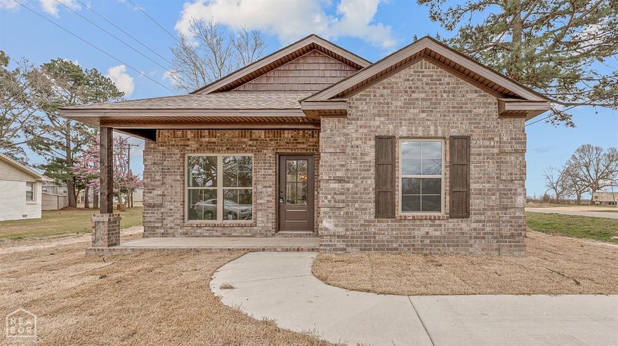 Welcome to 918 Winchester Rd., Leachville, AR! Discover the charm of this stunning brand-new construction home that perfectly combines modern elegance with functional living. This beautiful residence features 3 bedrooms and 2 bathrooms, showcasing impeccable curb appeal. The eye-catching front entry door sets the tone for the charm that awaits inside. Step into an inviting open-concept layout adorned with gorgeous white custom cabinetry throughout, creating a bright and airy atmosphere that is perfect for both entertaining and everyday living. The well-appointed kitchen boasts a generous island, a pantry, and stainless steel kitchen appliances, all highlighted by a stunning white subway tile backsplash. The master suite is a true retreat, featuring ample space and thoughtful design for your comfort. The split floor plan offers privacy and convenience, with two additional bedrooms and a beautifully designed hall bathroom, making it ideal for families or guests. A conveniently located laundry area. Enjoy outdoor living in your private backyard, enclosed by a new wooden privacy fence, perfect for gatherings, playtime, or simply unwinding after a long