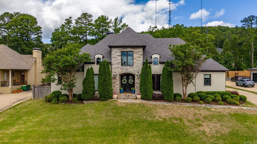 Beautiful custom built Chenal Valley Home. Exceptional design, fabulous décor!  The ultimate setting for family living and spectacular entertaining. Gourmet kitchen with professional appliances. Gorgeous formal dining and spacious family room with fireplace and soaring beamed ceiling. Luxurious, spa inspired primary suite on main level. Two additional full guest suites on main level.  Upstairs: Game room adjacent media rm or 4th bedroom and full bath. Safe room. Covered outdoor kitchen/media, Saltwater pool with fountains! Four car side load garage. Truly exceptional!  See agent remarks.