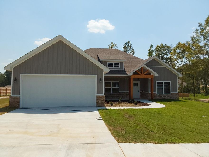 Beautiful new craftsman style home located in Crossroads Village. 4 bedrooms, 2 baths. Custom cabinets, granite countertops, eat-in kitchen, lovely pantry, ventless gas log fireplace, stainless appliances, LVP flooring in main areas, separate laundry room. This beauty is a MUST SEE!!!
