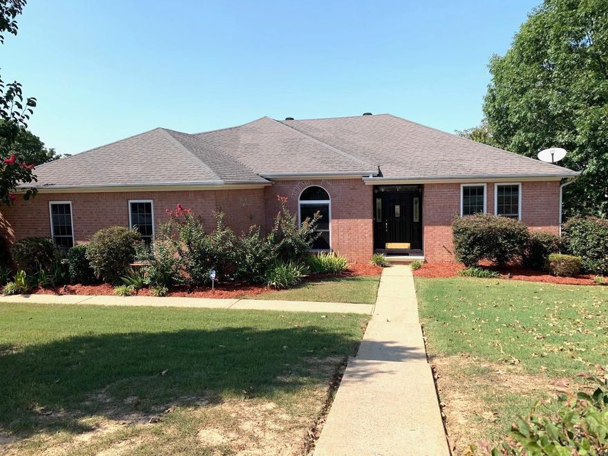 Beautiful 3 bed 2 bath split floor plan home that sits on a corner lot.  New paint throughout, new carpet in bedrooms. Kitchen offers breakfast bar, eat in area, great cabinet storage.  Formal dining room, nice family room with trey ceiling and gas starter fireplace.  Beautiful views from the back deck. Be sure to see  area under home on back left of home under deck.  Agents see remarks!!