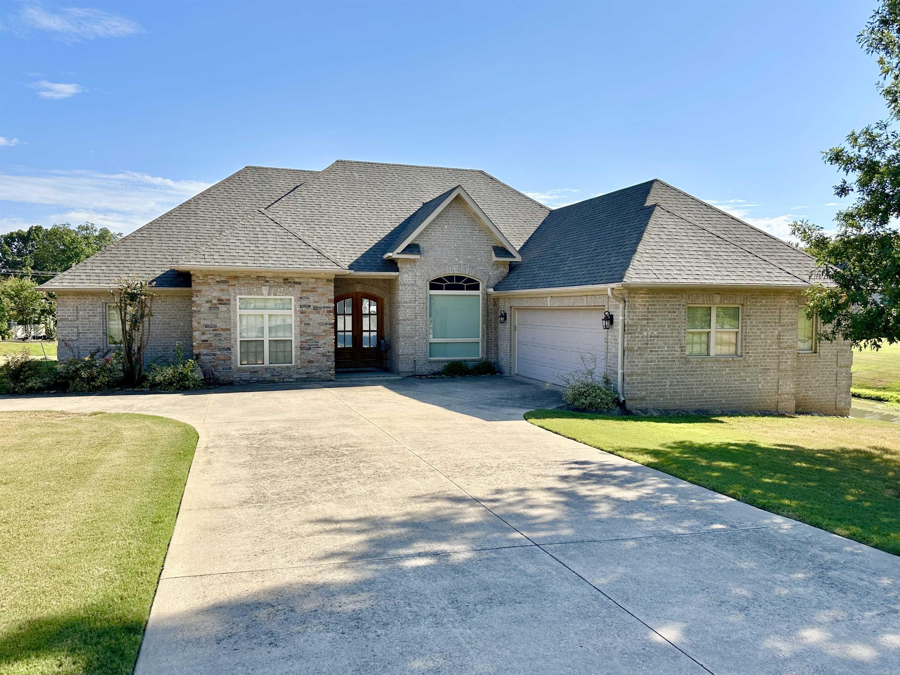 Welcome to this beautifully designed 3-bedroom, 2.5-bath home. Step inside to an open living area that flows seamlessly into a formal dining room, on to an eat-in kitchen and breakfast bar that make this home ideal for hosting family and friends. If you work from home, need a study space, or enjoy a spot for hobbies, a dedicated office is just off the living room. The large master suite is a true retreat, featuring private access to the back deck, an en-suite bath with a walk-in tiled shower, jetted tub, and a spacious walk-in closet complete with a dressing table. The kitchen offers stainless steel appliances and abundant counter space. Step outside to enjoy the large screened porch, where you can unwind to the soothing sounds of the pond and fountain. A convenient walk-up counter with a sliding pass-through window makes entertaining a breeze, while enjoying the in-ground pool and tranquil pond views. Soak uo the sun or relax on the upper and lower decks.. Recent updates add even more value, including a brand-new roof, a new pool pump, and the freshly stained deck, ensuring peace of mind and move-in-ready appeal. Don't miss the chance to make this stunning property your own!