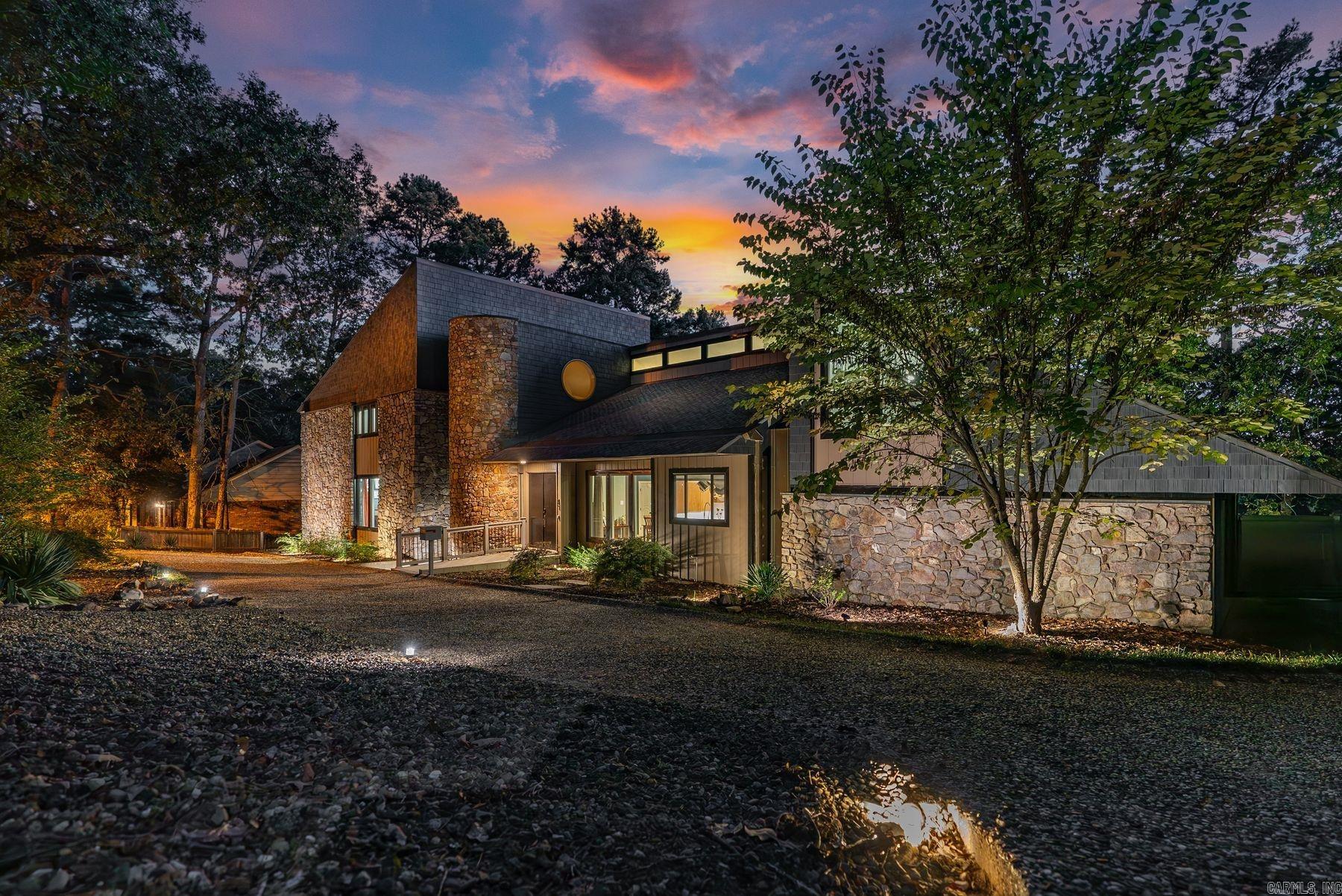 This exceptional 6,066 sq. ft. contemporary home blends mid-century modern design with numerous updates, set on an oversized lot in sought-after Pleasant Valley. Featuring 4 oversized bedrooms and 5.5 bathrooms, the property offers spacious luxury living. The entrance showcases a tranquil koi pond and an elegant oculus. Inside, the updated kitchen boasts sleek countertops, stainless steel appliances, and an induction range, flowing into a large eat-in area and formal dining room—perfect for entertaining. The main level features two inviting living spaces, and a large office with built-ins, while upstairs, you’ll find a versatile playroom or game room along with additional bedrooms. The lower level offers additional living spaces. Recent updates include a sauna bath, new kitchen and dining flooring, carpet (2020), new windows, a CertainTeed Presidential Shake roof with lifetime warranty, crawl space encapsulation (2021), and new siding, gables, and a stunning primary shower (2022). The large fenced backyard and circular driveway add to the home's appeal.