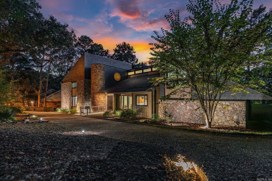 This exceptional 6,066 sq. ft. contemporary home blends mid-century modern design with numerous updates, set on an oversized lot in sought-after Pleasant Valley. Featuring 4 oversized bedrooms and 5.5 bathrooms, the property offers spacious luxury living.   The entrance showcases a tranquil koi pond and an elegant oculus. Inside, the updated kitchen boasts sleek countertops, stainless steel appliances, and an induction range, flowing into a large eat-in area and formal dining room—perfect for entertaining. The main level features two inviting living spaces, and a large office with built-ins, while upstairs, you’ll find a versatile playroom or game room along with additional bedrooms. The lower level offers additional living spaces.   Recent updates include a sauna bath, new kitchen and dining flooring, carpet (2020), new windows, a CertainTeed Presidential Shake roof with lifetime warranty, crawl space encapsulation (2021), and new siding, gables, and a stunning primary shower (2022). The large fenced backyard and circular driveway add to the home's appeal.