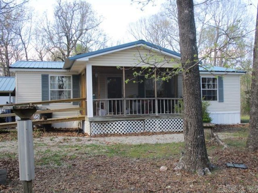 Modular Home nestled on 20.88 Wooded Acres M/L, Large Screened Front Porch perfect for Morning Coffee or Late Afternoon Relaxation,  Home includes 3 BR 2 BA, Wood Laminate and Carpet Flooring, Primary BR has Double Closet and Primary Bath has 4' Shower and Corner Tub, Kitchen Appliances include Dishwasher, Refrigerator, and Electric Range, Washer and Dryer is also included. Directly behind the home is a Shop with Wood Stove and Electric, also included is an RV Cover, Lean To and Stable/Barn with Electric.  This is a perfect property for the DEER HUNTER ENTHUSIAST.  Don't let this property slip away!