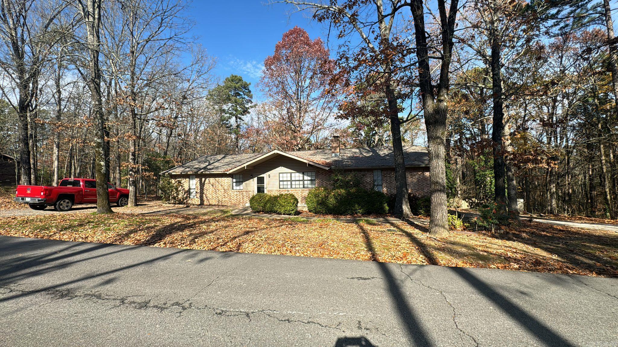 This charming home sits on a spacious half-acre lot! Features include updated appliances (stove & dishwasher), newer roof (3 years old!), and brand new HVAC system. Enjoy the cozy brick and vinyl exterior and the large backyard with a deck.