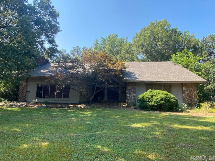 Are you looking for a hidden gem? This diamond in the rough is situated on a beautifully shaded, 2.5 acre lot in a quite country setting located in the heart of Weiner, Arkansas. The Contemporary design features of this home are unlike homes of today. A soaring vaulted, tongue and groove ceiling and rock fireplace draw you to the spacious great room. Built-ins are plentiful throughout and include designated private office space just off the two story foryer. A retro styled, eat-in kitchen boasts brick flooring and an abundance of cabinetry. Newer stainless applinaces include double ovens and built-in dishwasher, as well as a stainless farm sink. Other recent updates include a new roof in 2023 and a walk-in tile shower. A lofted second floor contains additional bedrooms, gameroom with bar and additional 1/2 bath. This home is priced to Sell as is and is awaiting it's new owners!