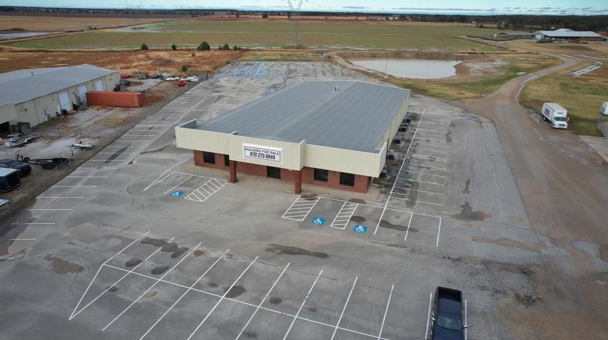 Opportunity awaits on this huge commercial building just outside city limits. Over 12,000 square feet of office space is ready for its next owner! Building also includes 180 parking spots and sits on 3+ acres.