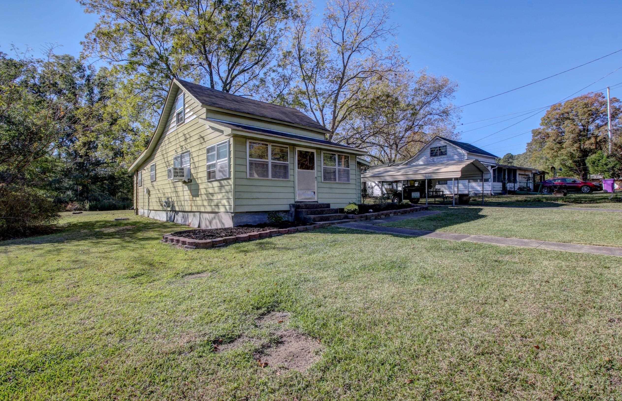 This charming bungalow-style home offers comfort and character in the quiet town of Bauxite. With 2 bedrooms, 1 bath, and a large yard featuring beautiful landscaping, itās perfect for a new family, rental opportunity, or a first-time homeowner. Enjoy the enclosed porch, ideal for morning coffee or evening cocktails. While it needs a little TLC, itās move-in ready and full of potential. Donāt waitāthis gem wonāt last long. Letās make it yours today! ?