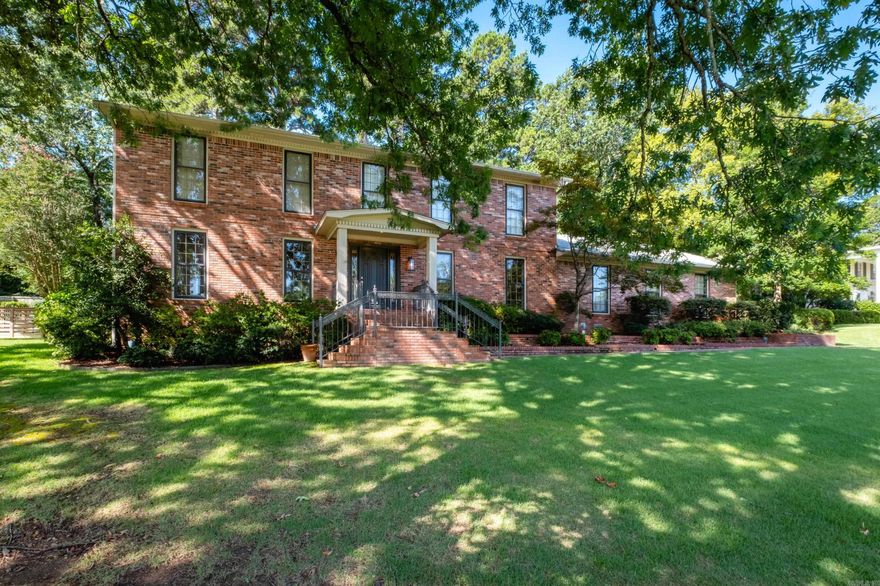 Great family home on large lot with side loading 3 car garage and spacious screen porch next to large brick patio. Down stairs has site finished hardwoods, large den with tasteful wet bar and fireplace. Fabulous kitchen with Thermador and Kitchenaid appliances, ice maker and wonderful storage, built-in fridge does not have water to it. Guest bedrooms have built in desks and double closets. One guest bedroom has own bath. Incredible storage throughout. Dog house and dog run not warranted. Whole house generator.