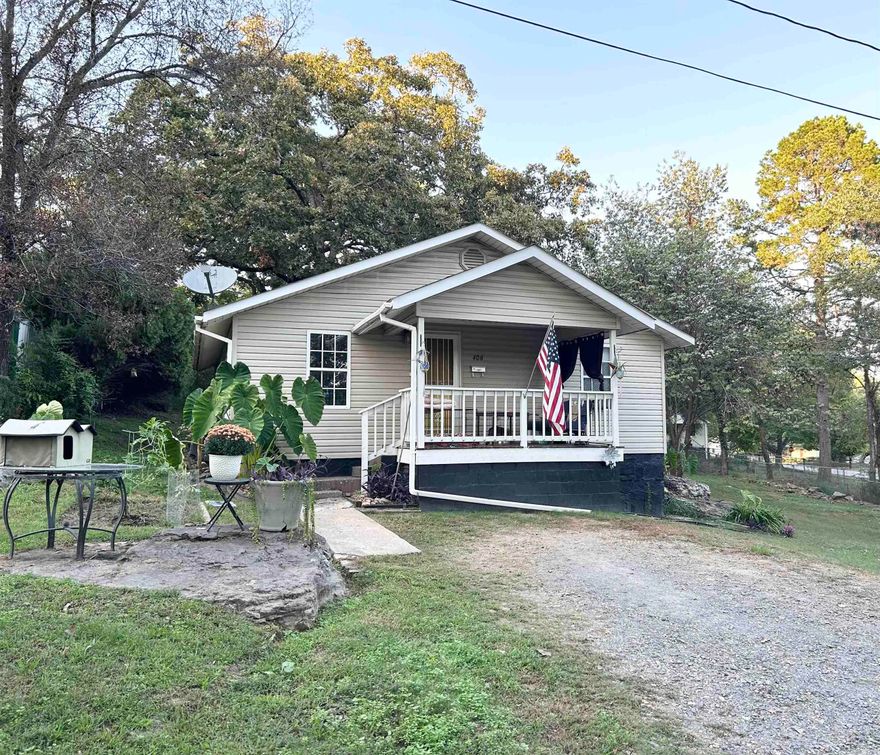 Delightful 2-bedroom, 1-bathroom residence boasting a relaxing front porch and additional lot. The extra lot could be used for a carport or garage. The home features a cozy living room, open kitchen space, a laundry room off the back which leads to the fenced backyard with large shade trees. Discover this jewel in proximity to Heber Springs schools and under 5 minutes from Sandy Beach. Check in out before it is gone; schedule a showing today.