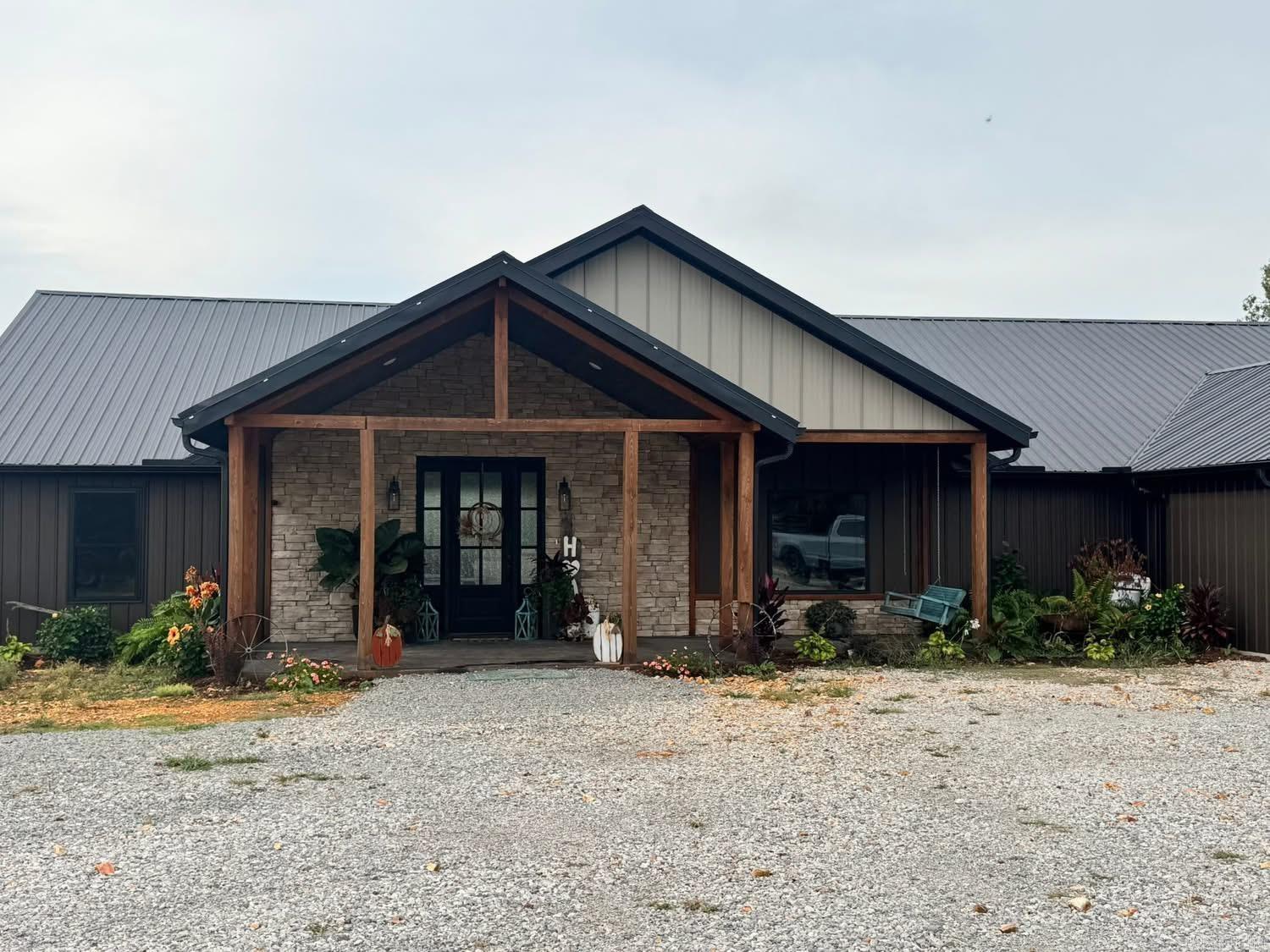 Built in 2024, this stunning 3 bed, 3 bath home offers the perfect mix of comfort, functionality, and outdoor living. Set on 52 beautiful acres of rolling hills, the property features a 24x60 shop, barn, and a large outdoor arena—ideal for horses, hobbies, or farm life. Enjoy prime hunting, peaceful surroundings, and plenty of space to roam. Whether you're looking for a private homestead, recreational getaway, or working property, this one checks all the boxes. Just minutes from Batesville, but feels a world away!